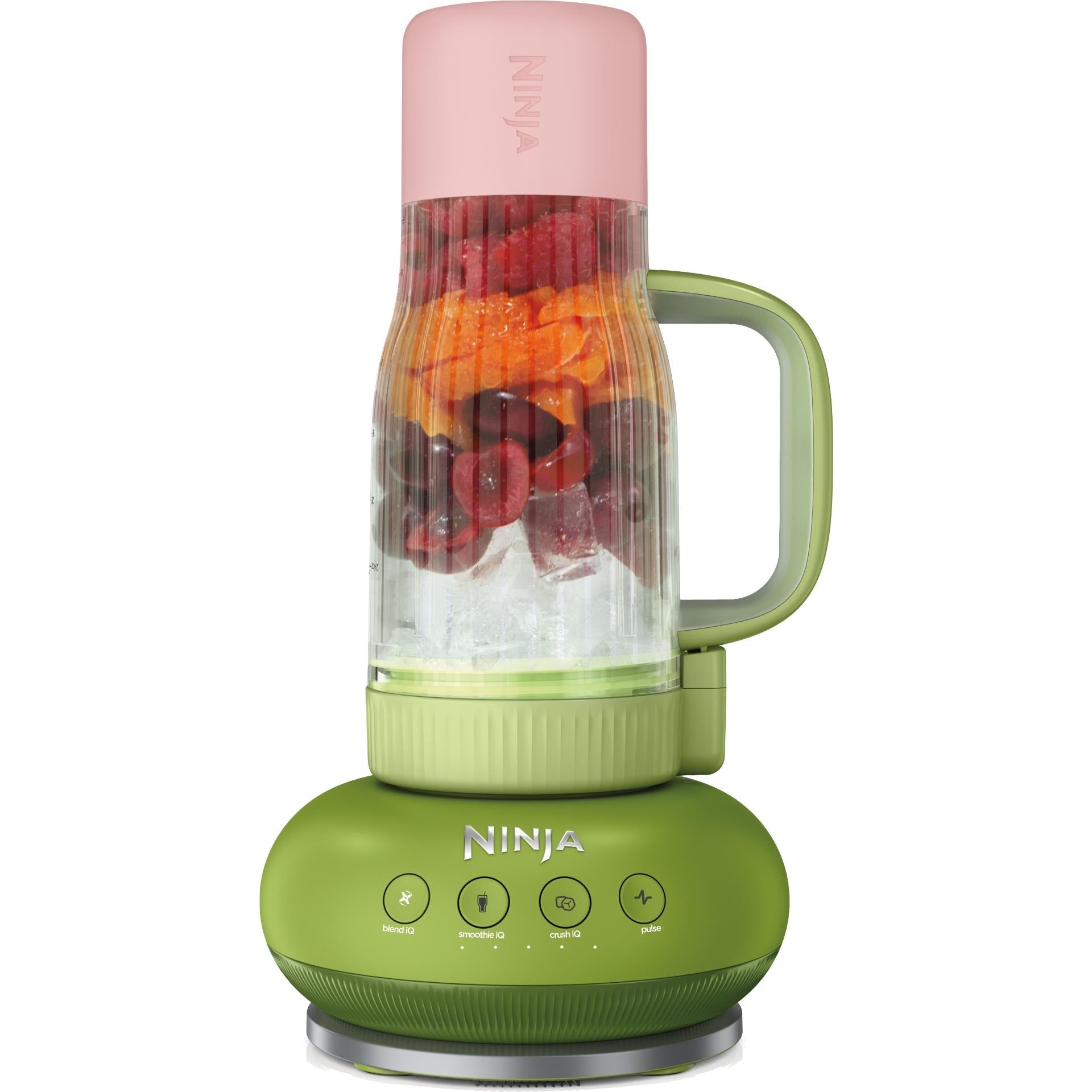 Portable blender with pink lid, green base, and clear jar filled with red liquid