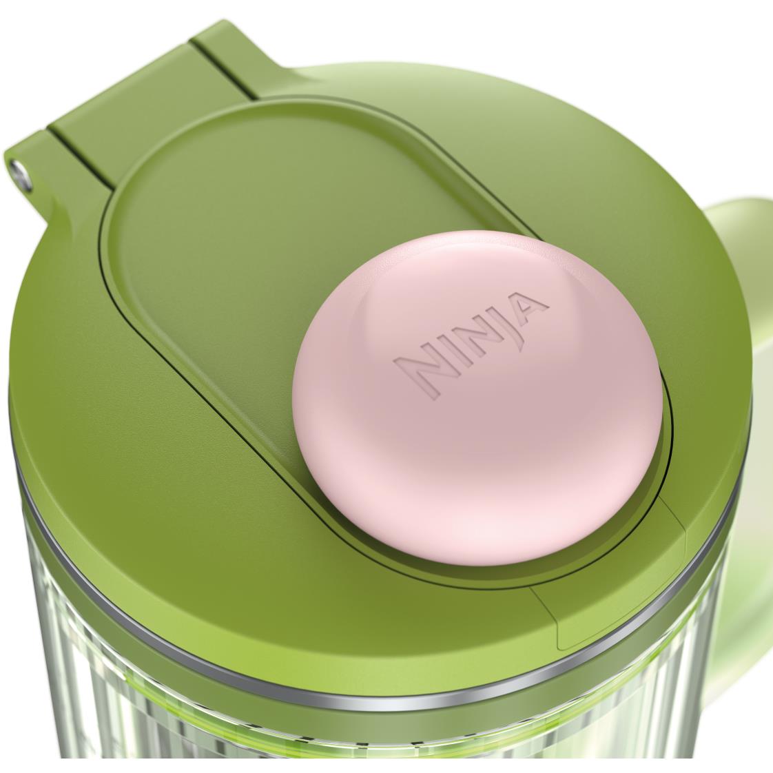Portable blender lid with pink top button and green control cover