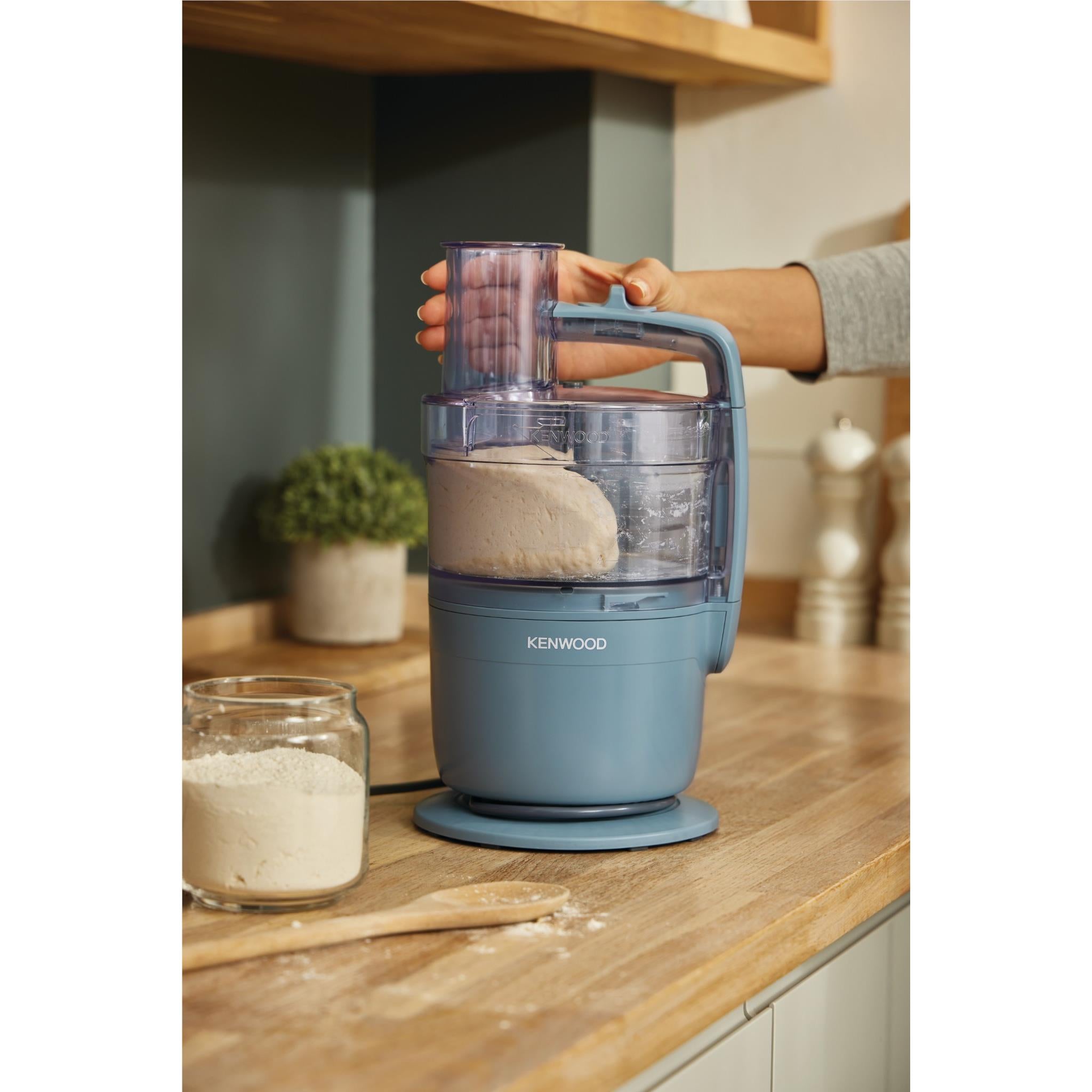 Storm Blue food processor with transparent bowl holding pale cream mixture