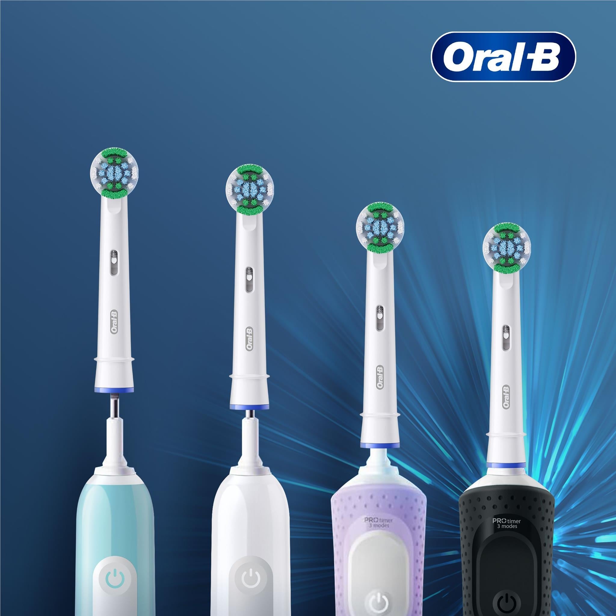 Four Oral-B electric toothbrush brush heads with green bristle clusters
