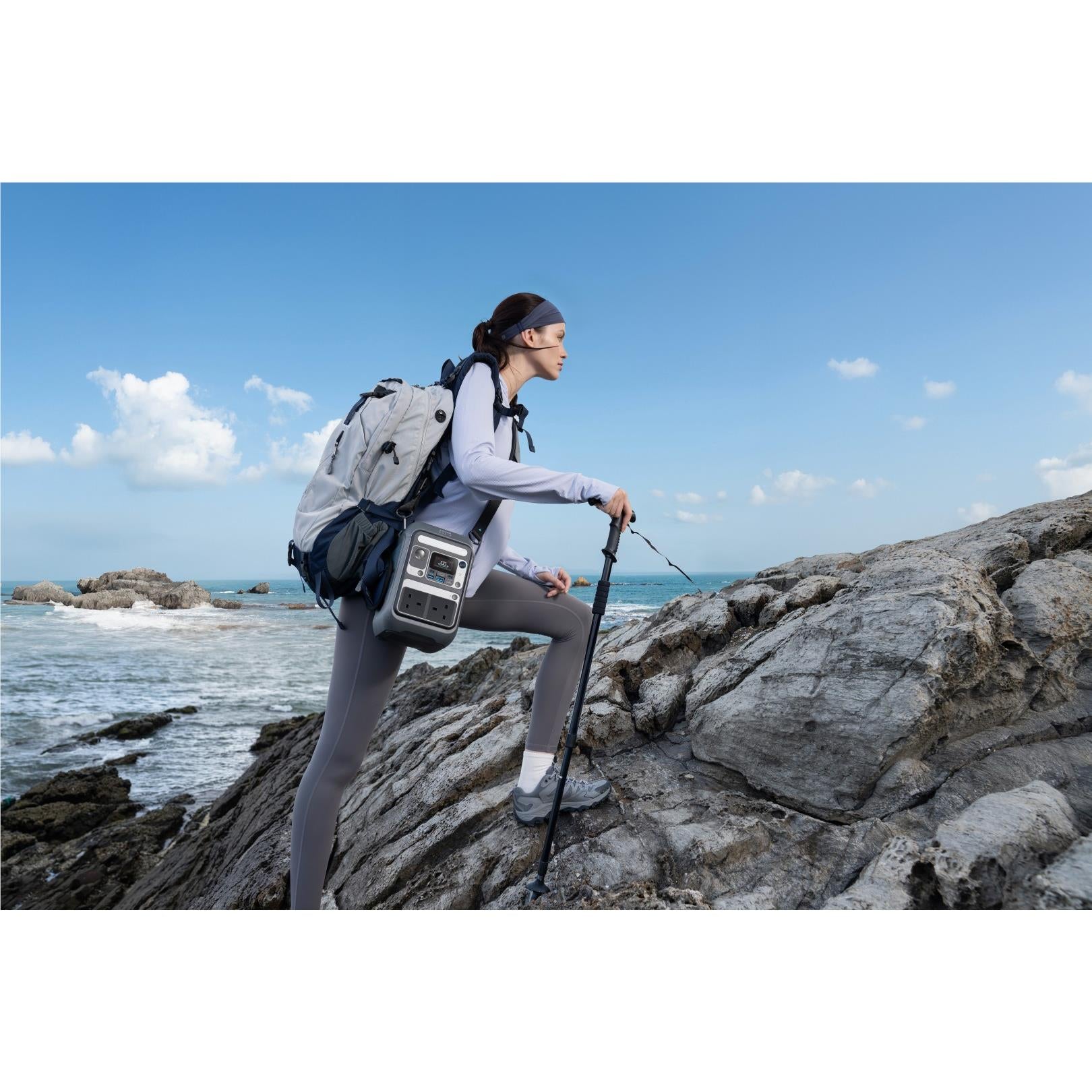 Grey Anker SOLIX portable power station carried on a backpack with illuminated panel