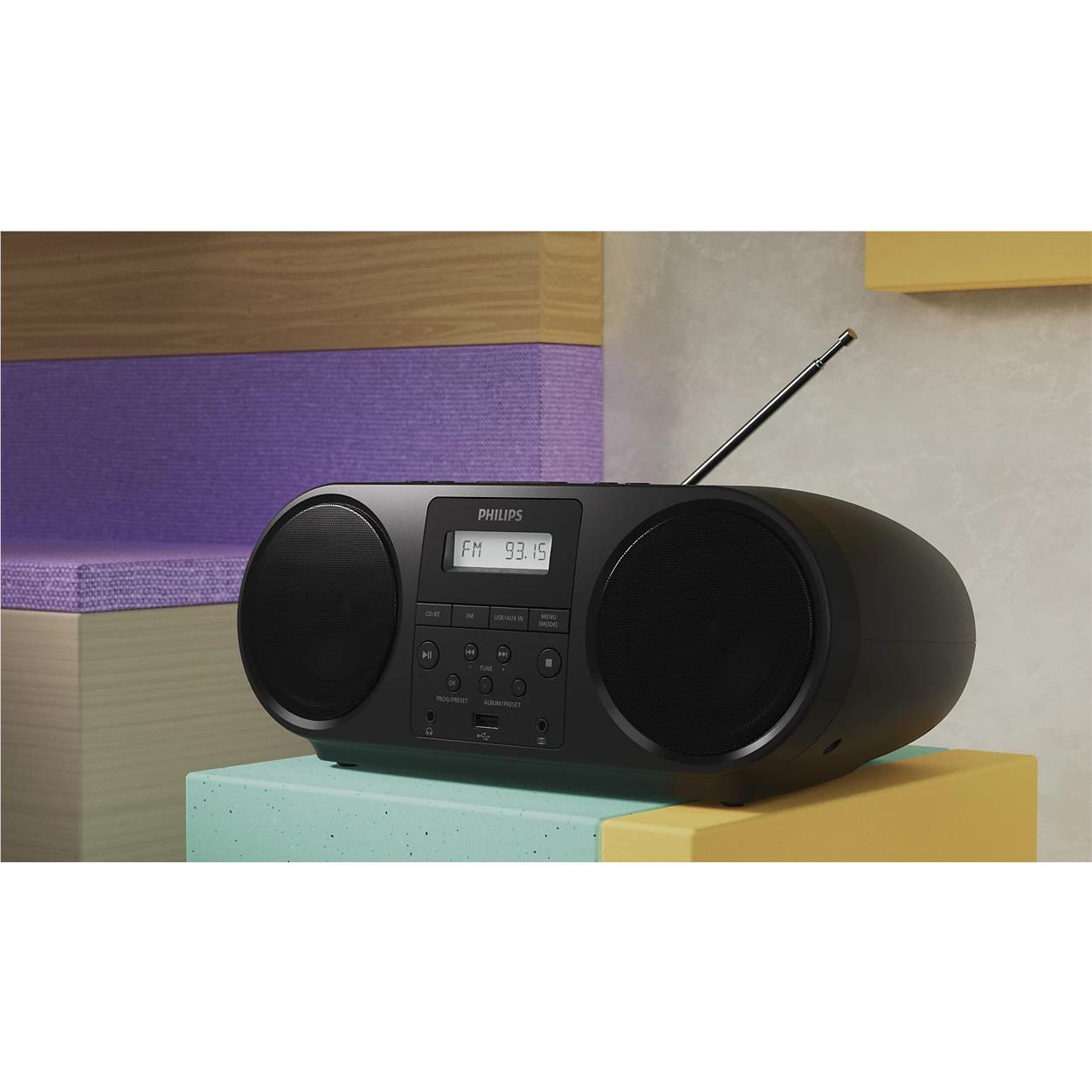 Black portable CD sound machine with dual speaker grilles and telescopic antenna