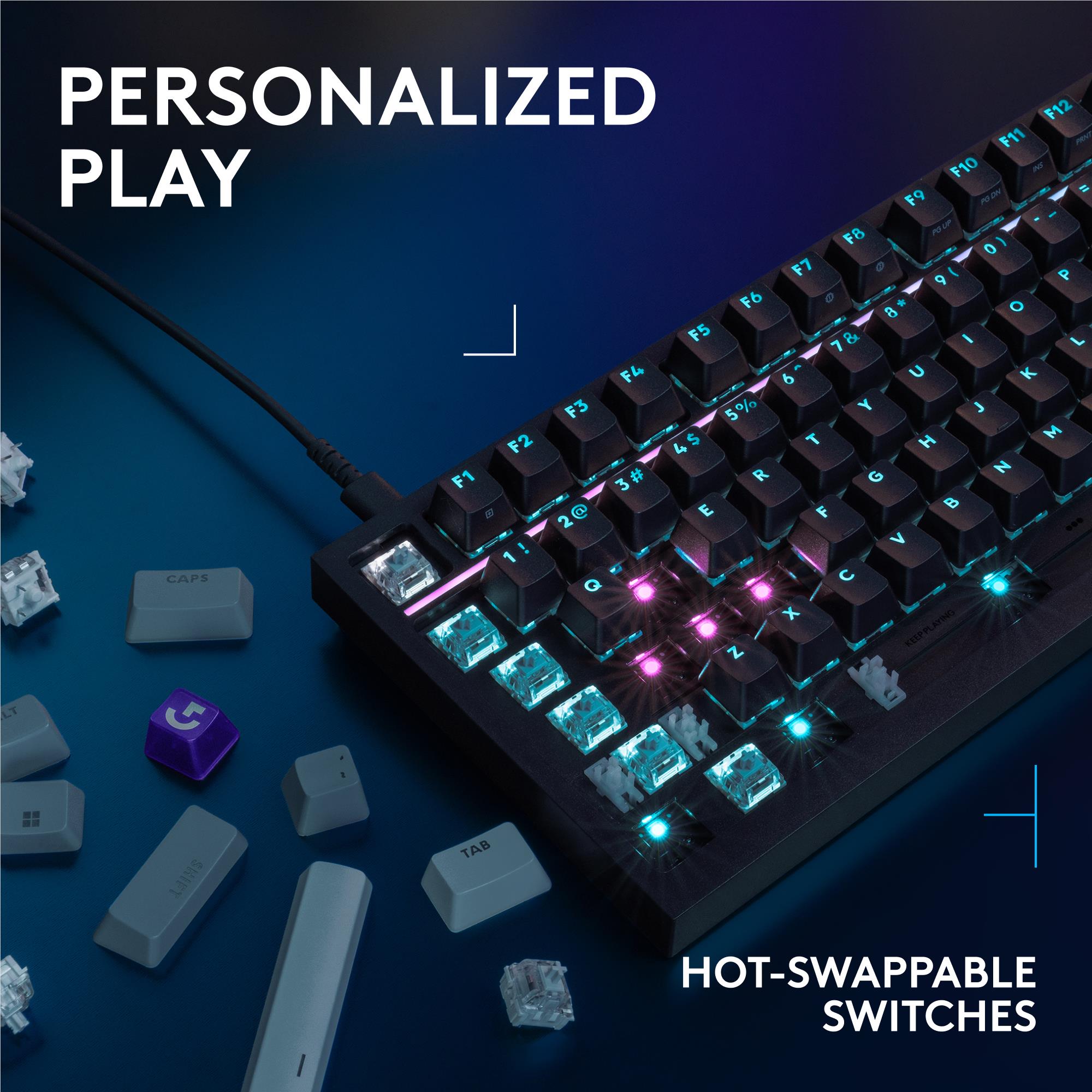 Black mechanical keyboard with RGB backlit keys and hot-swappable switch accents
