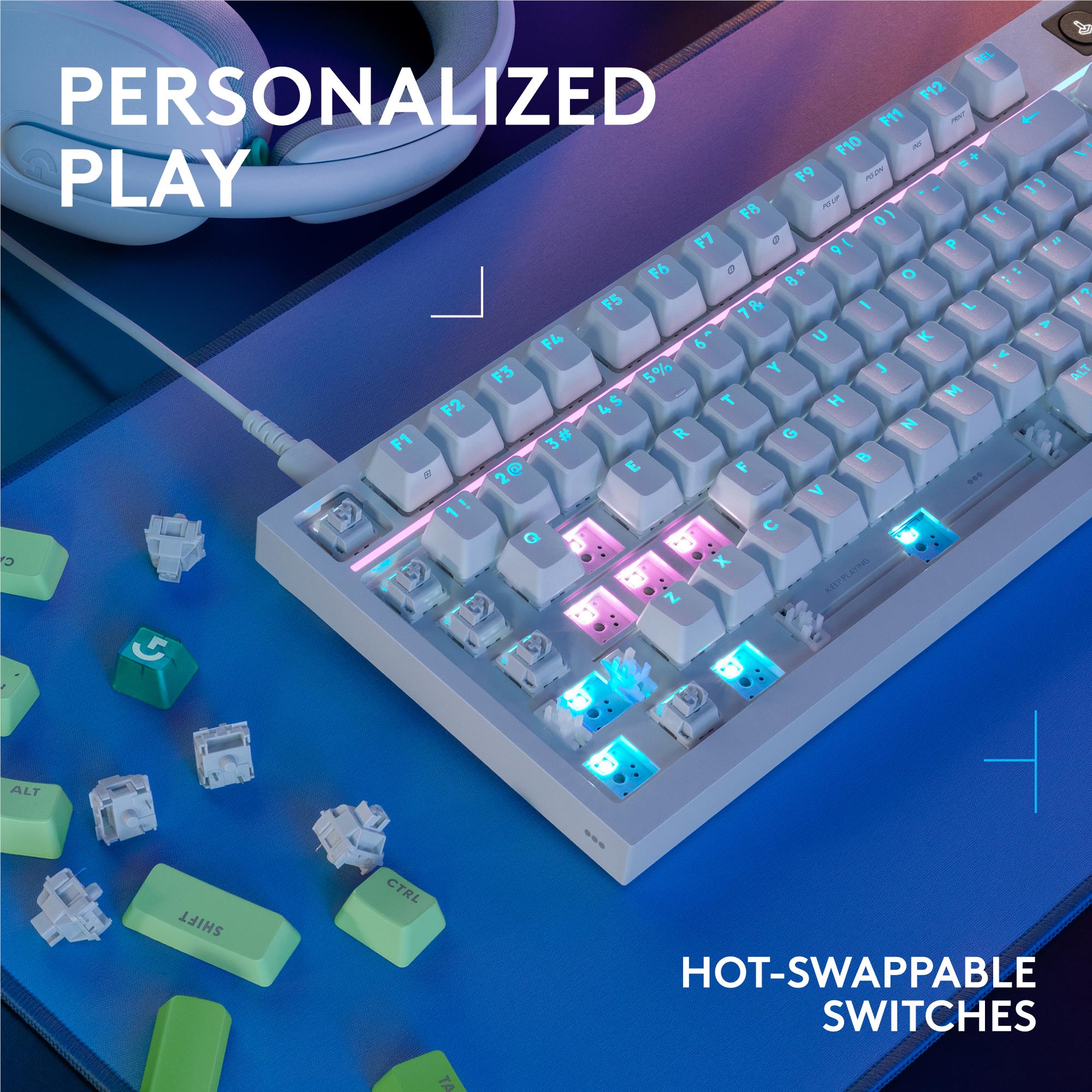 White mechanical gaming keyboard with colorful RGB backlighting and keycaps