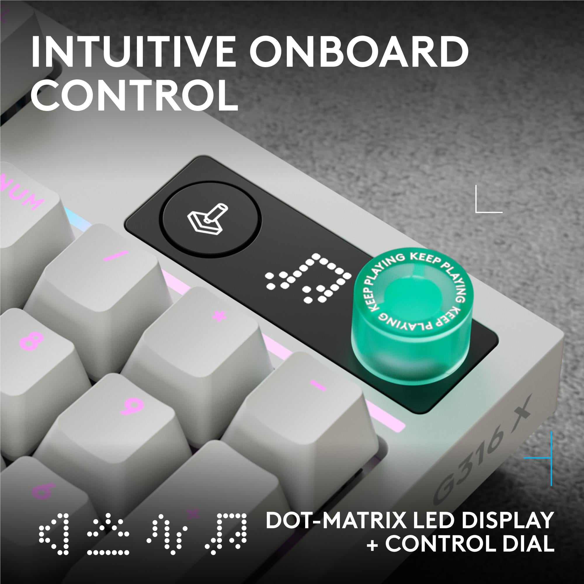 White keyboard close-up showing dot-matrix LED display and round control dial