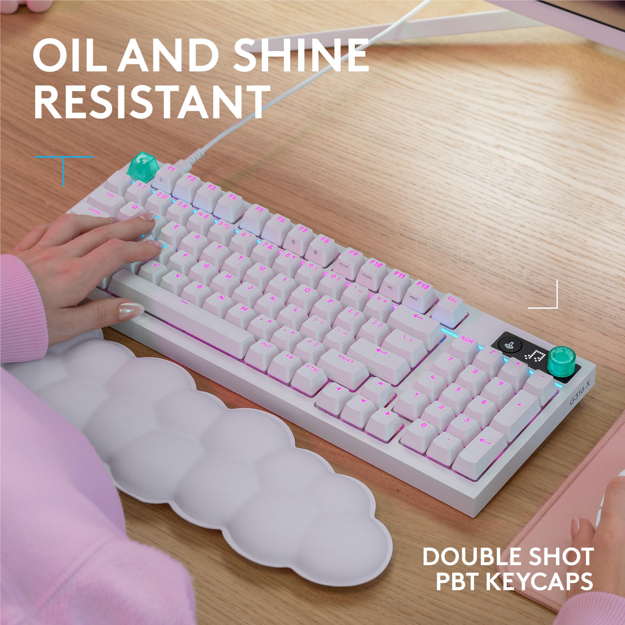 White wired gaming keyboard with textured double-shot style keycaps and RGB lighting