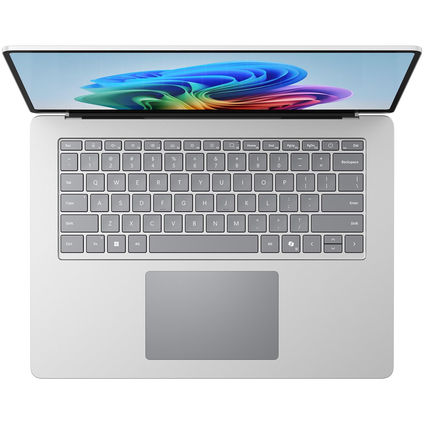 Platinum keyboard and trackpad view with display top portion visible