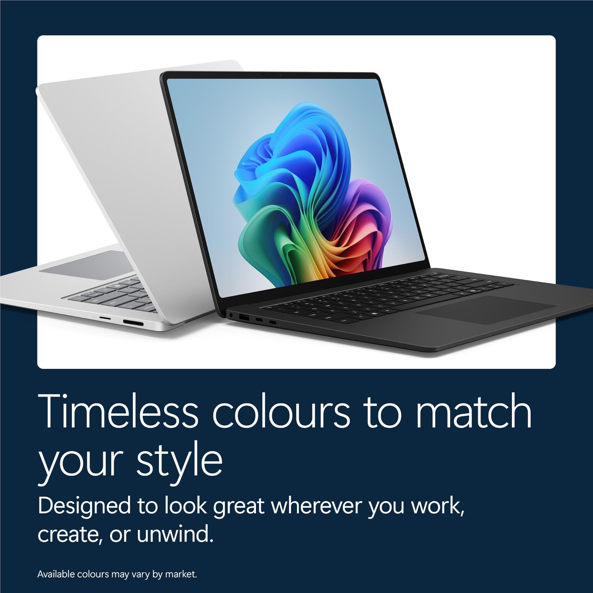 Platinum and black laptops open with colorful screen displays