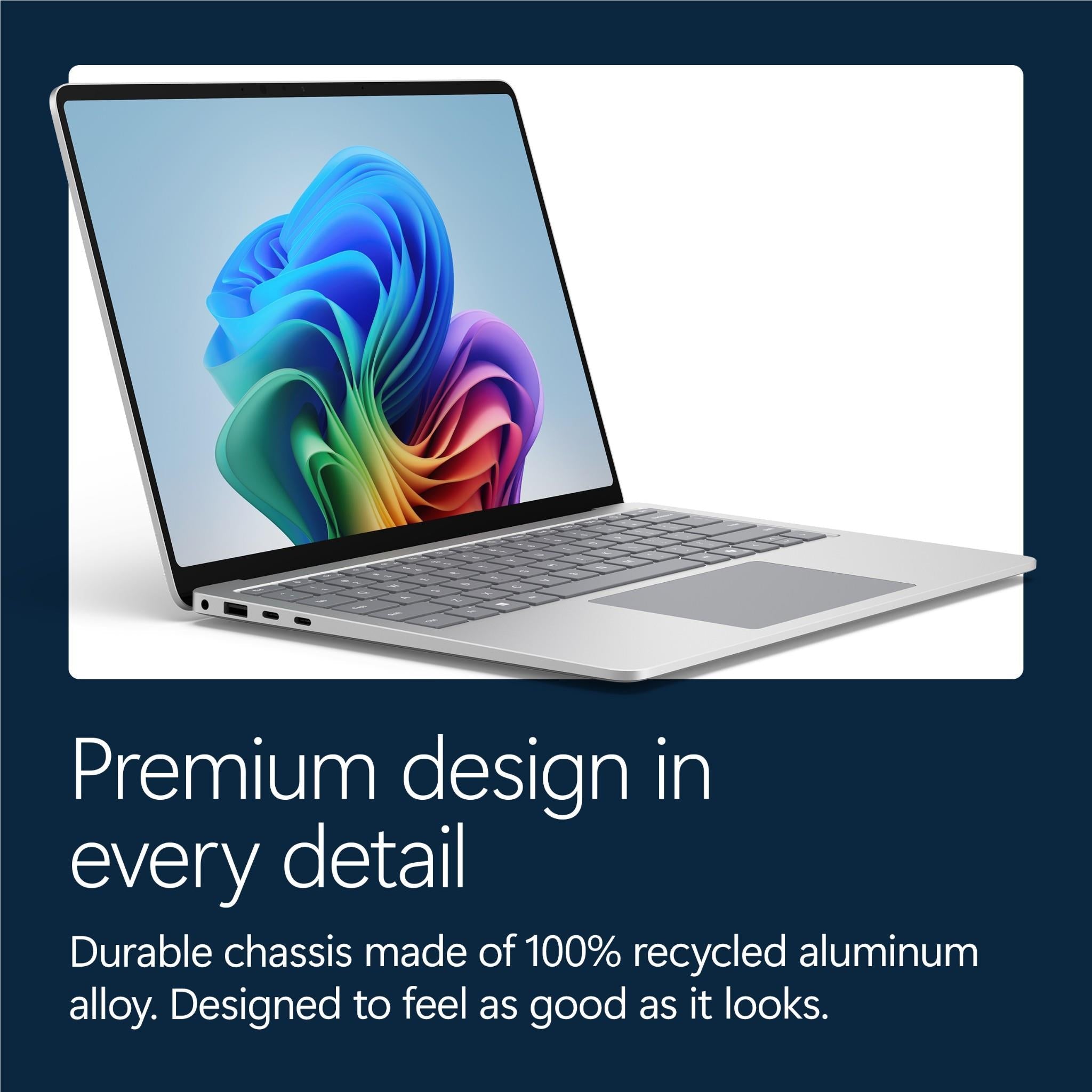 Angled platinum laptop with open display and gray keyboard