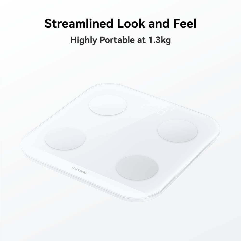 Frosty white smart body fat scale, angled top view with four circular sensors