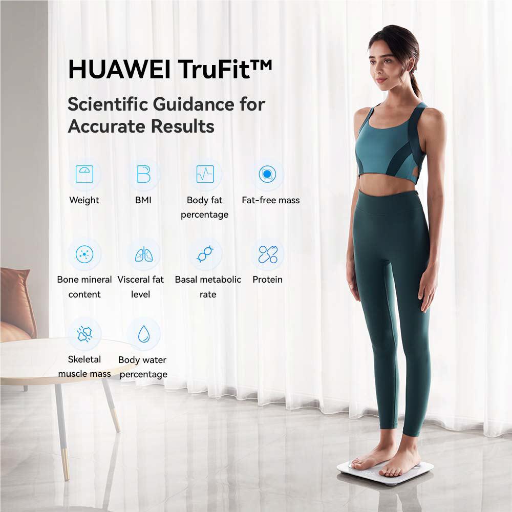 Frosty white Bluetooth body fat scale with four sensors under a standing person