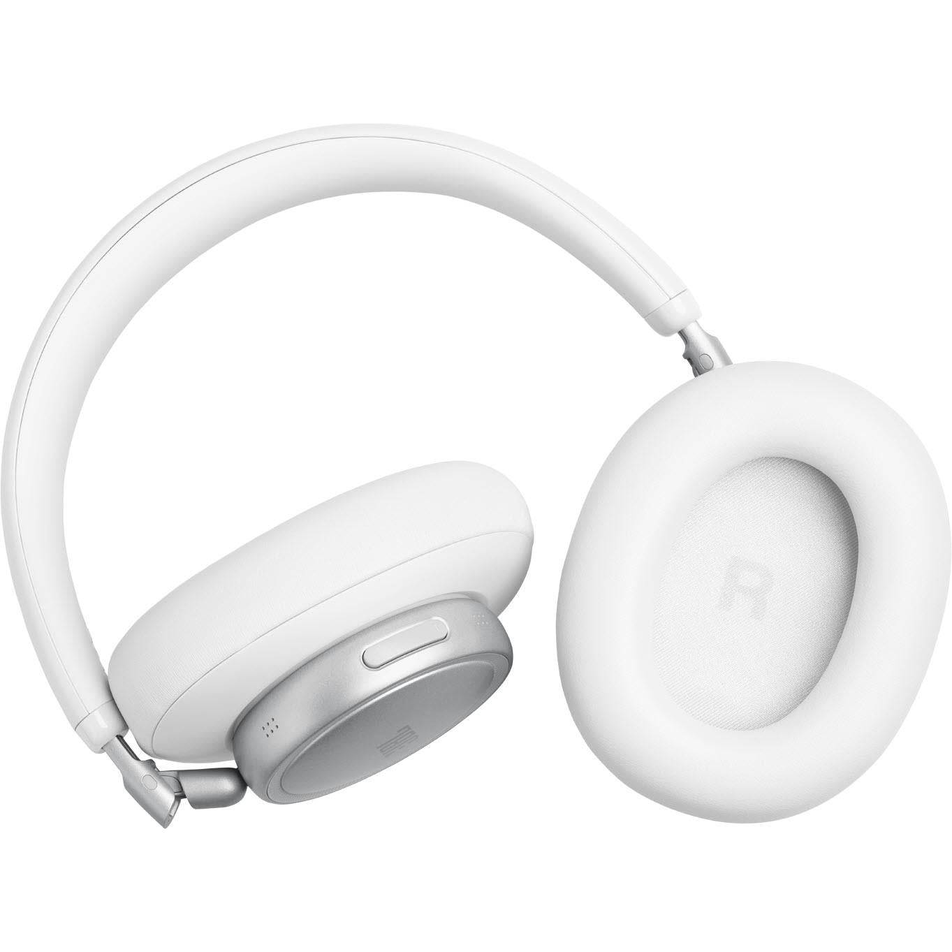 White over-ear Bluetooth headphones, close side view of earcup controls