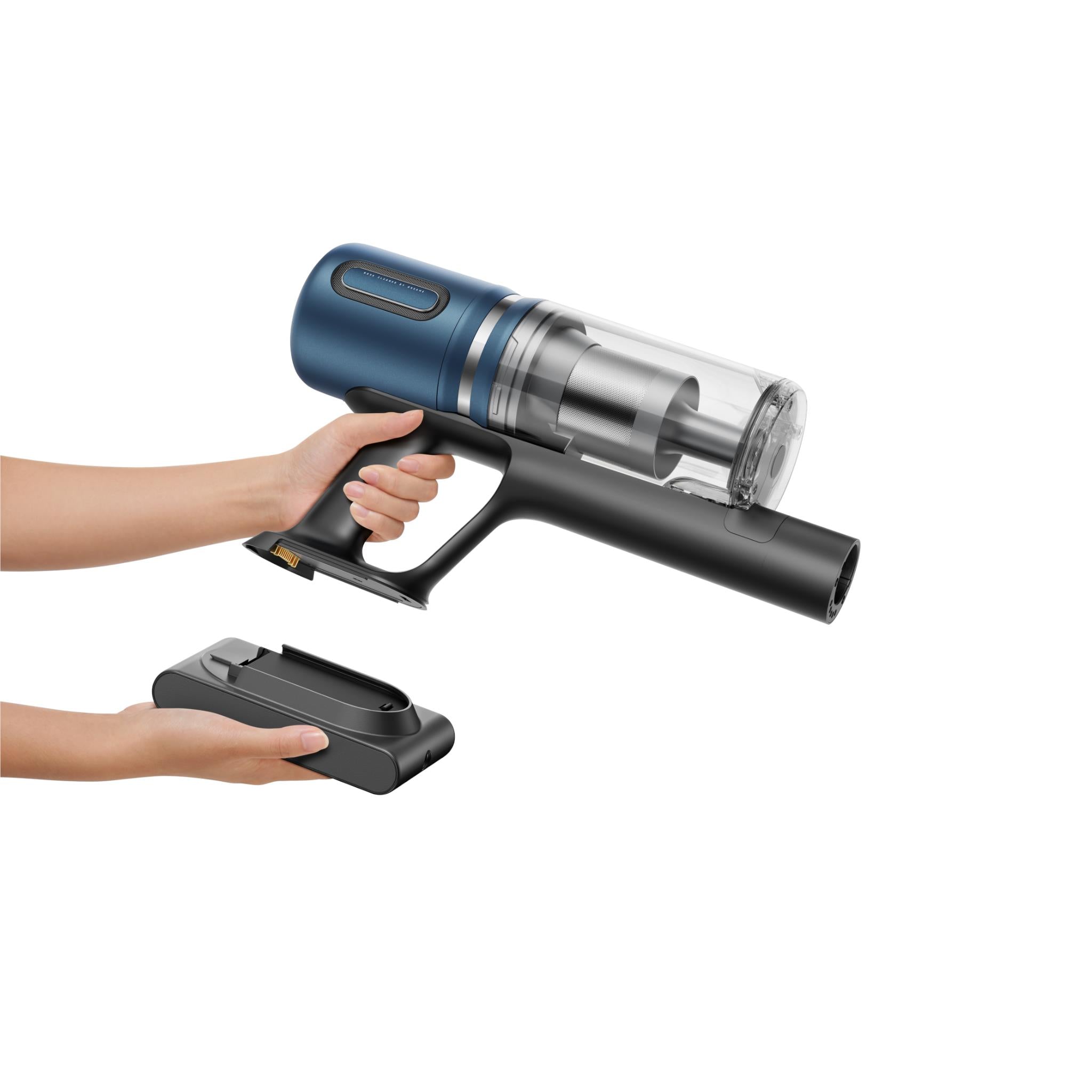Cordless stick vacuum being held by hand and placed on the charging dock