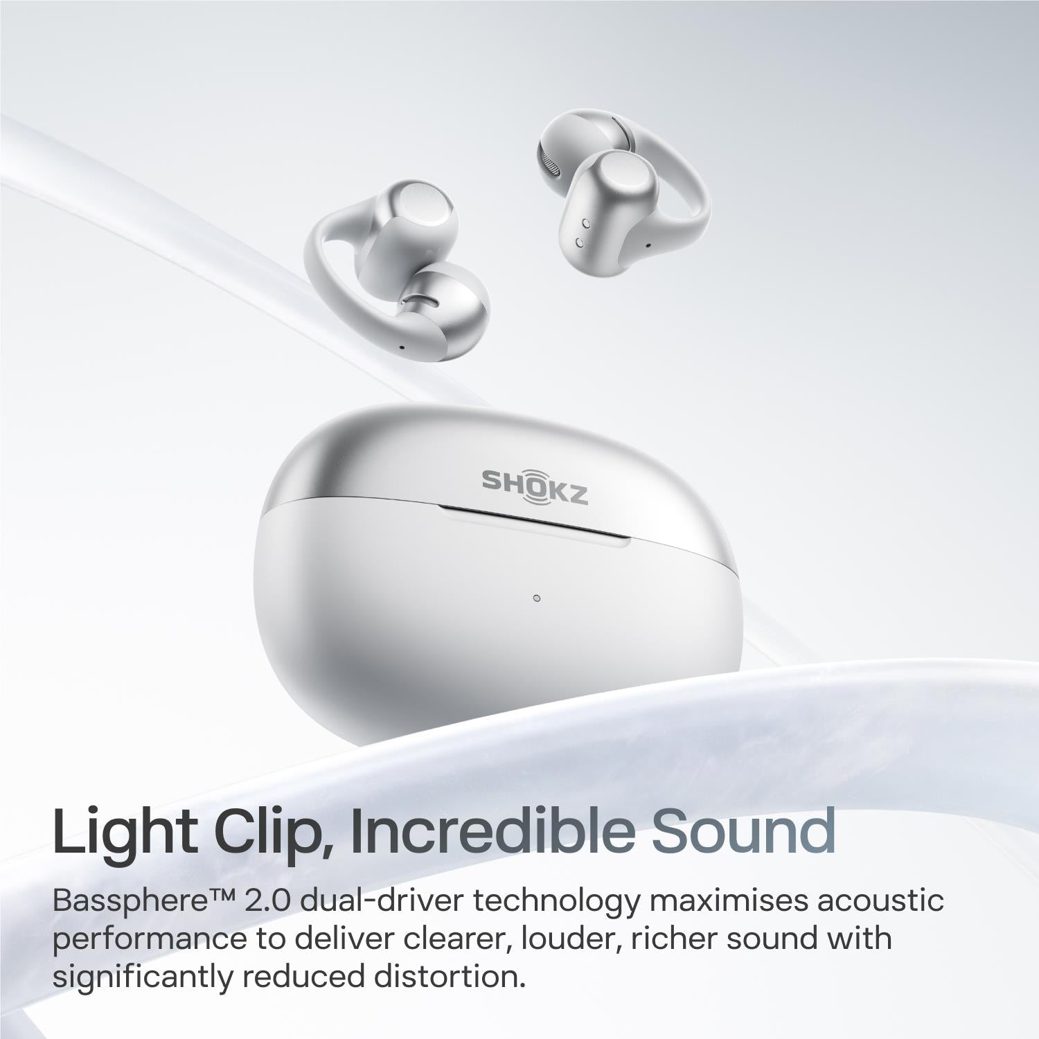 Grey open-ear wireless earbuds and charging case with text overlay.