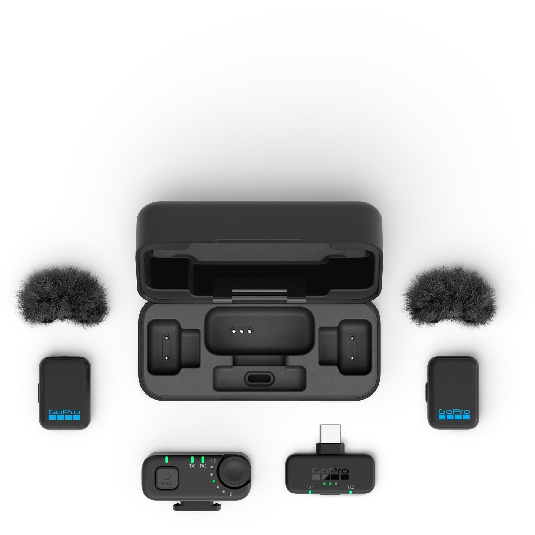 GoPro wireless microphone kit components with two furry mic windscreens and receiver