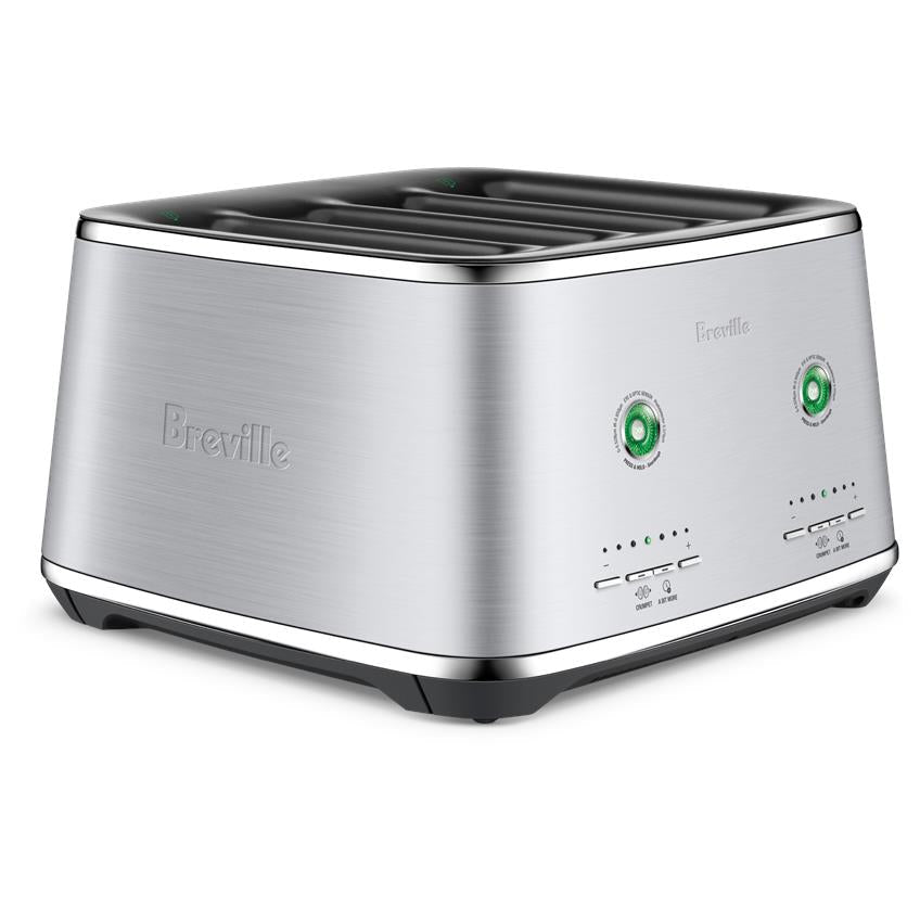 Brushed stainless 4-slice toaster angled view with green control dials and slots