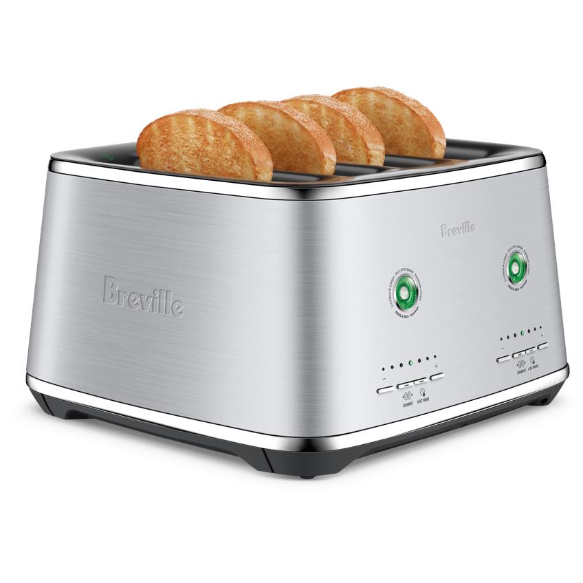 Brushed stainless 4-slice toaster with four bread slices inserted, green control dials