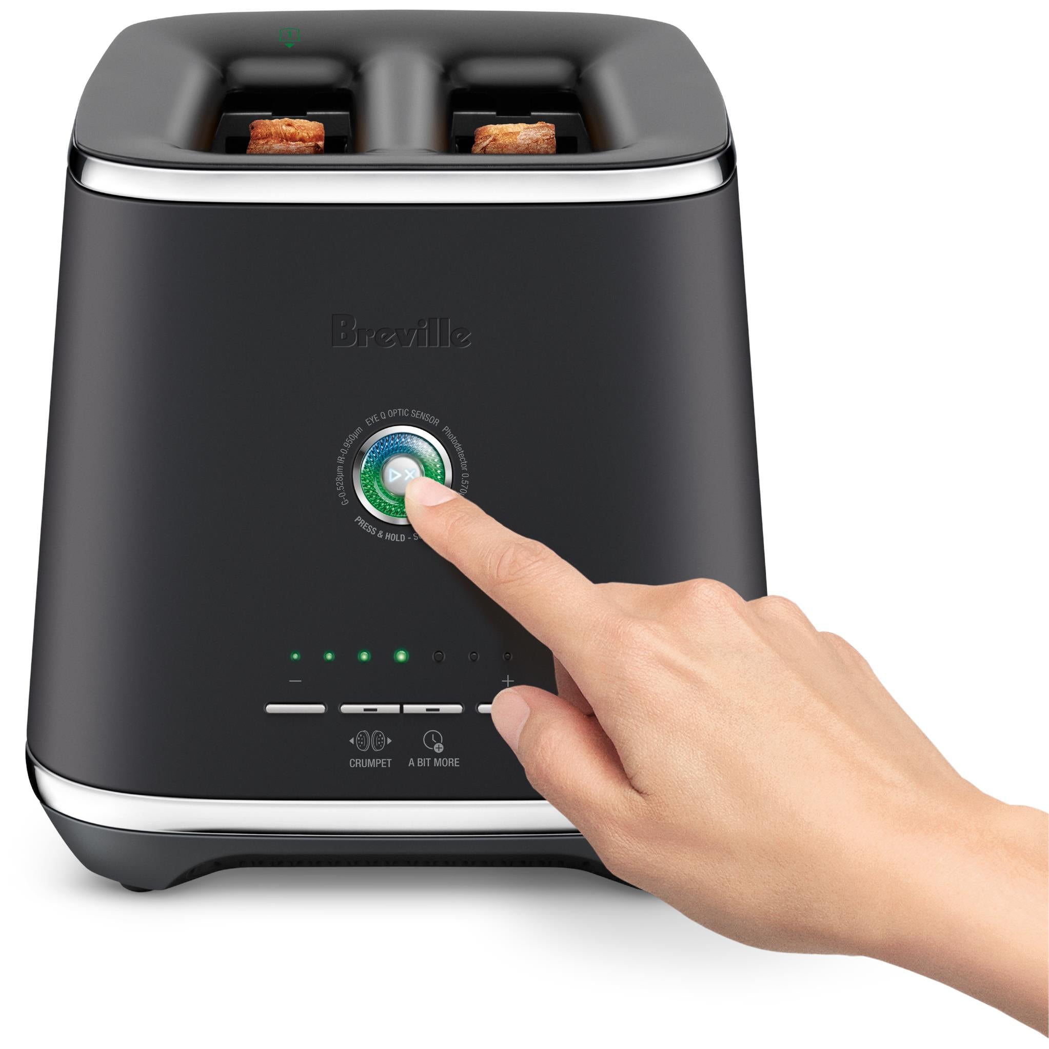 Black toaster with two slots; hand presses the control panel