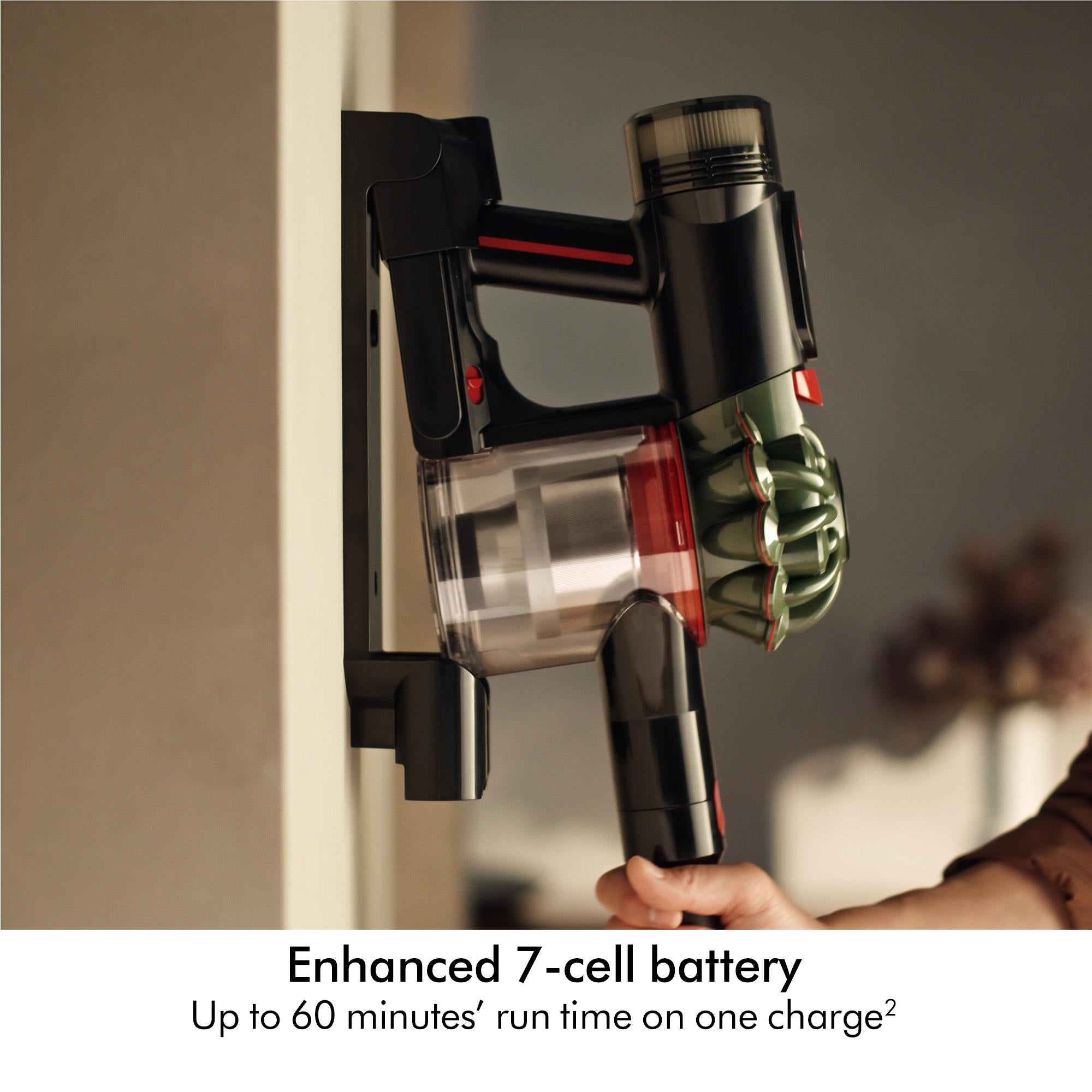 Dyson cordless vacuum cleaner with handheld unit and crevice tool attachment