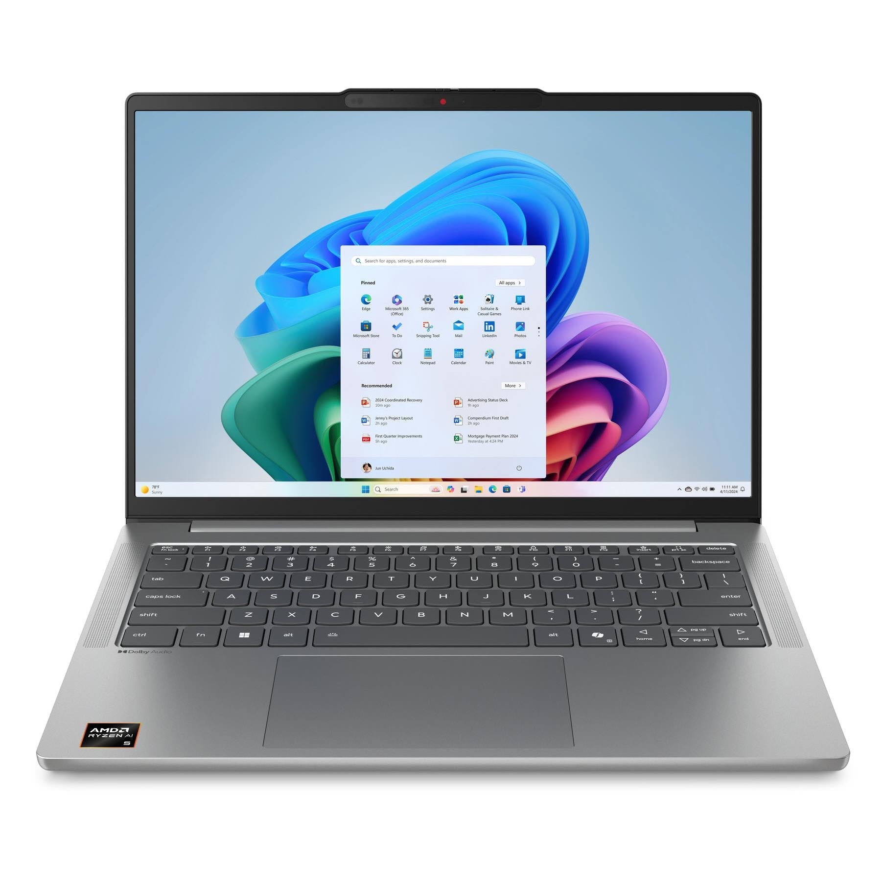 Lenovo IdeaPad Slim 5 laptop open on desk, showing keyboard and Windows-style screen
