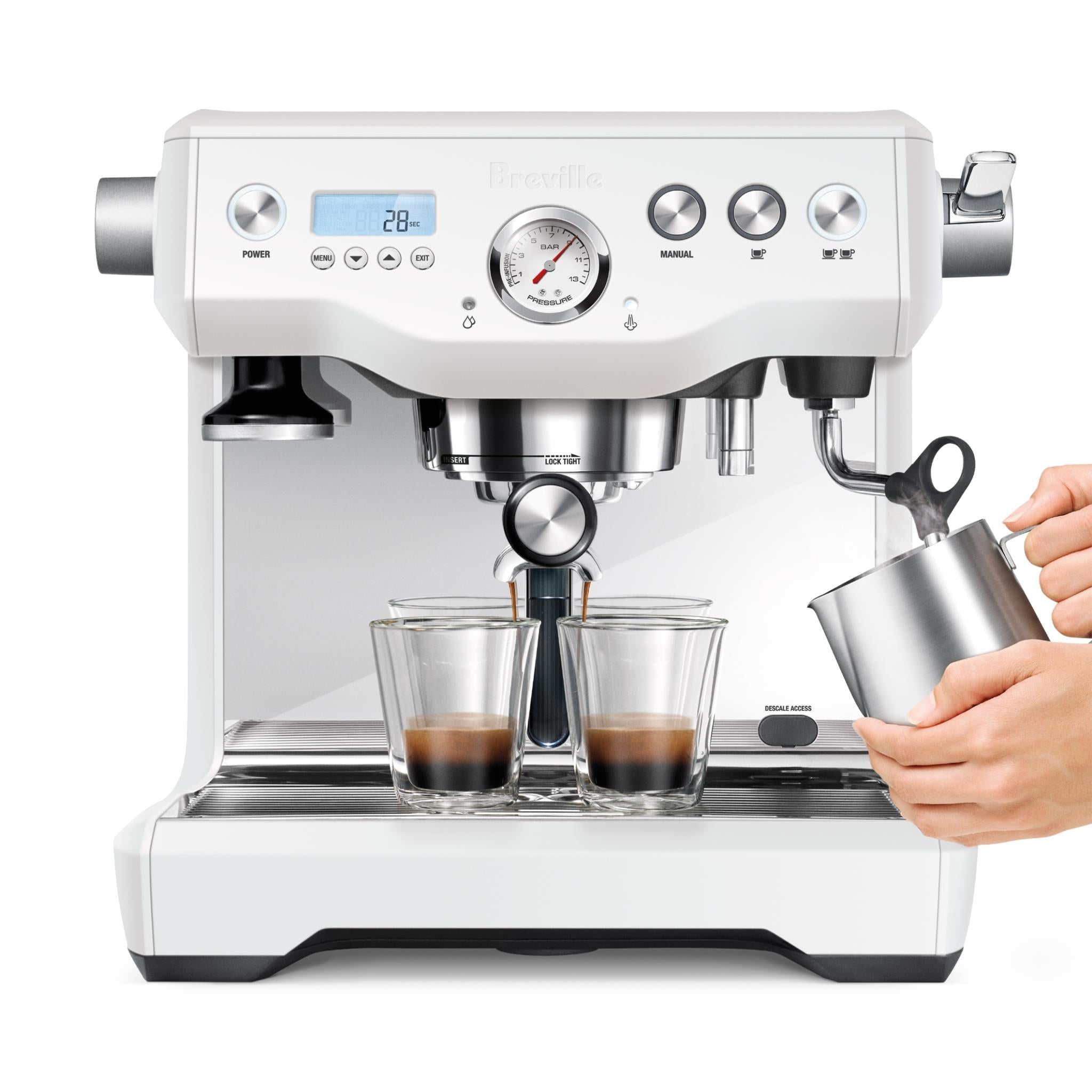 Breville Dual Boiler espresso machine dispensing, with cups and portafilter