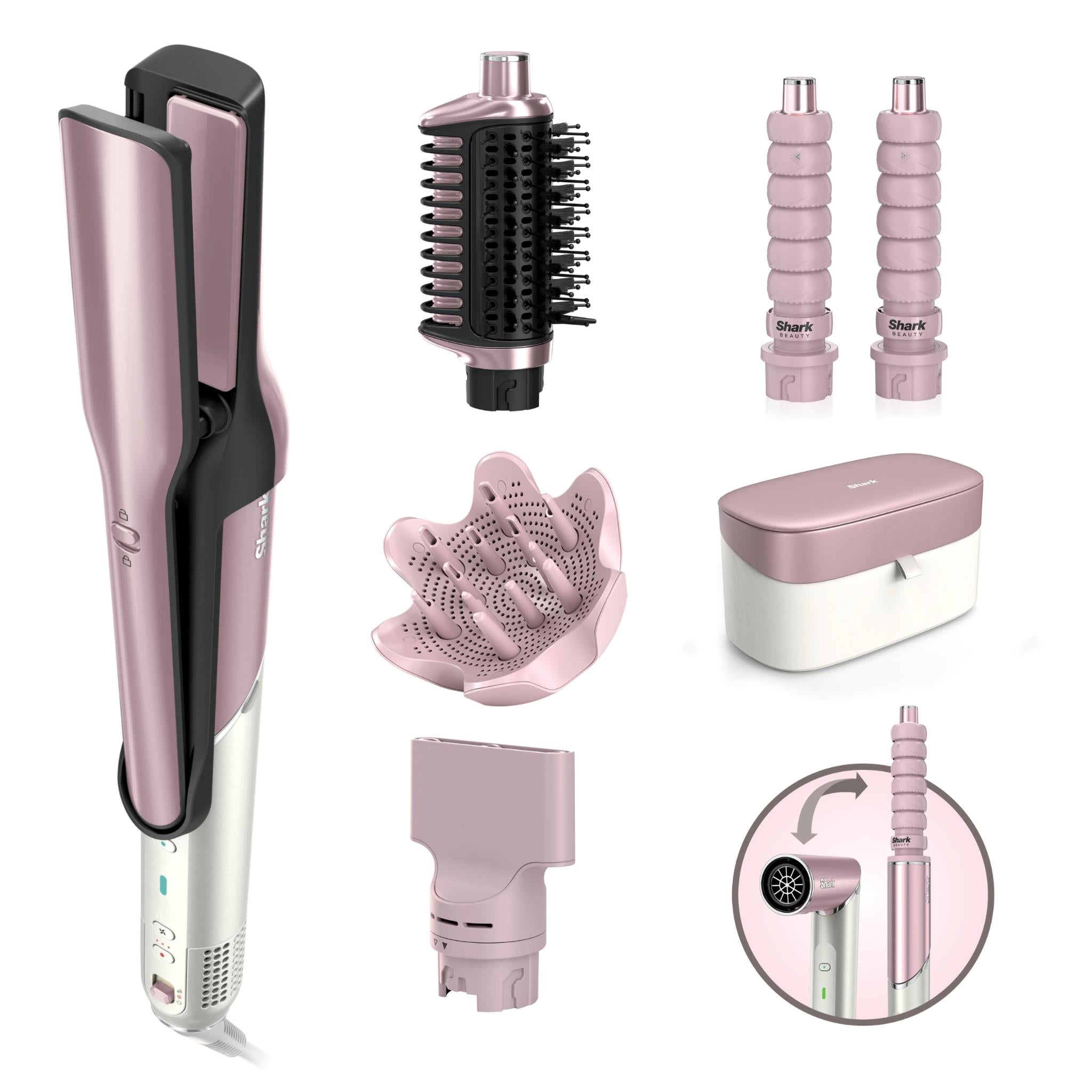 Pink hot air hair styling tool with brush, nozzle attachments, and storage box