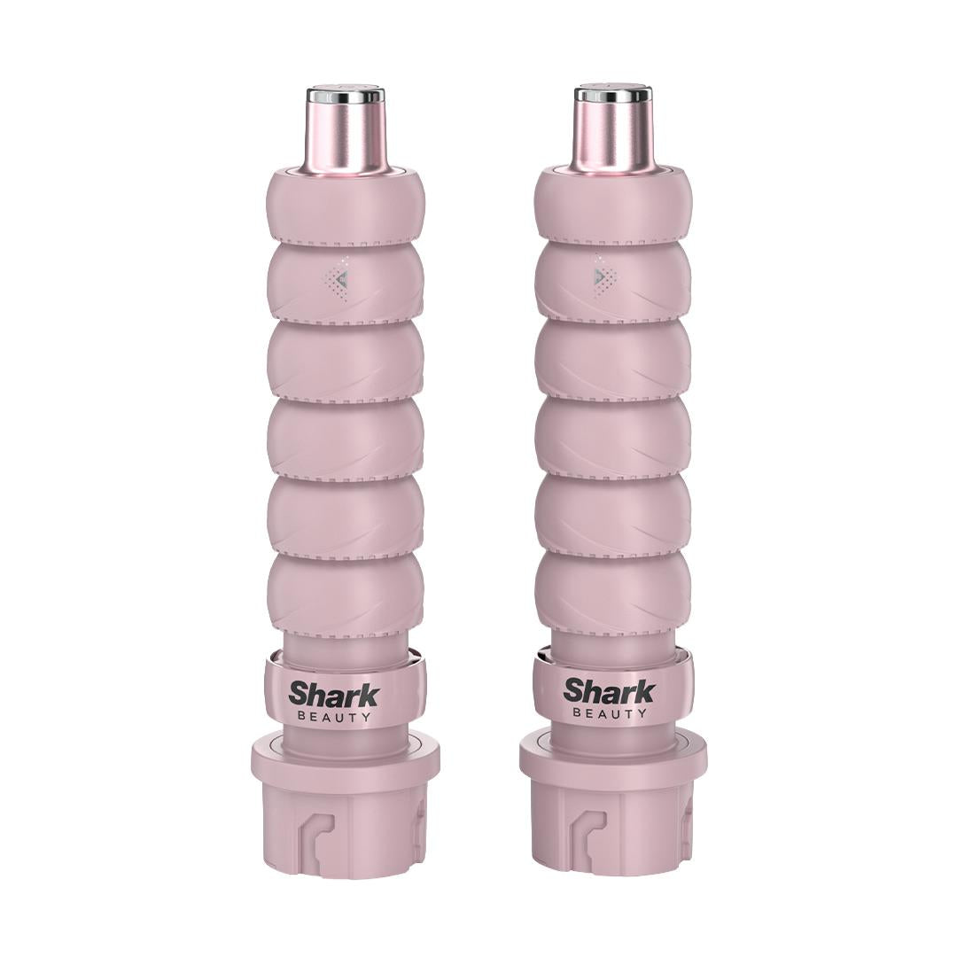 Two pink hot air curling and styling attachments with ribbed airflow sleeves