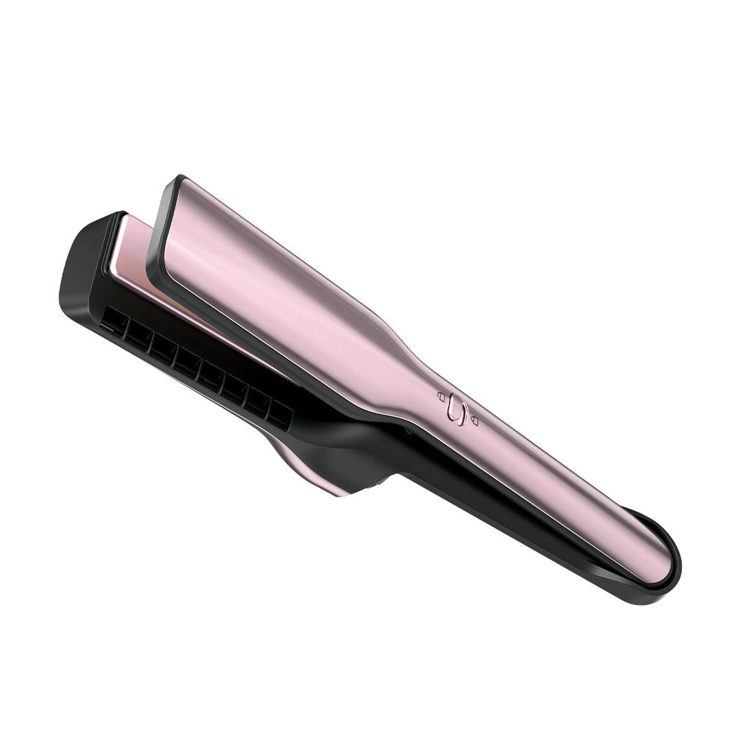 Pink flat hot air styling tool with vented plates and black side vents
