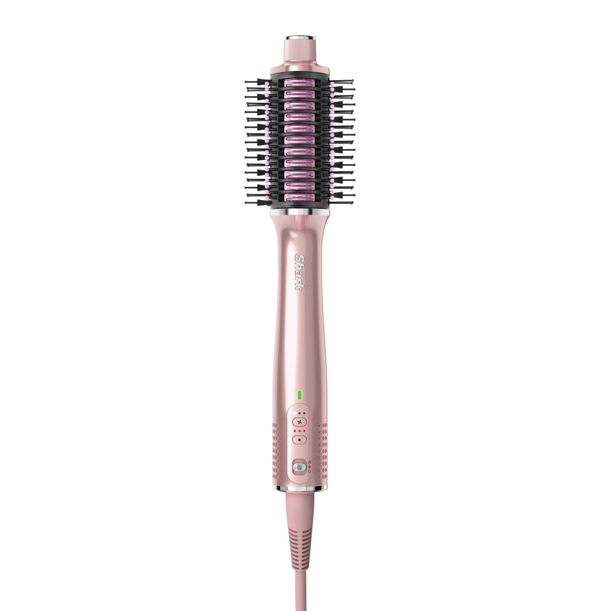 Pink hair styler with round brush head, dense bristle rows, and vented grip