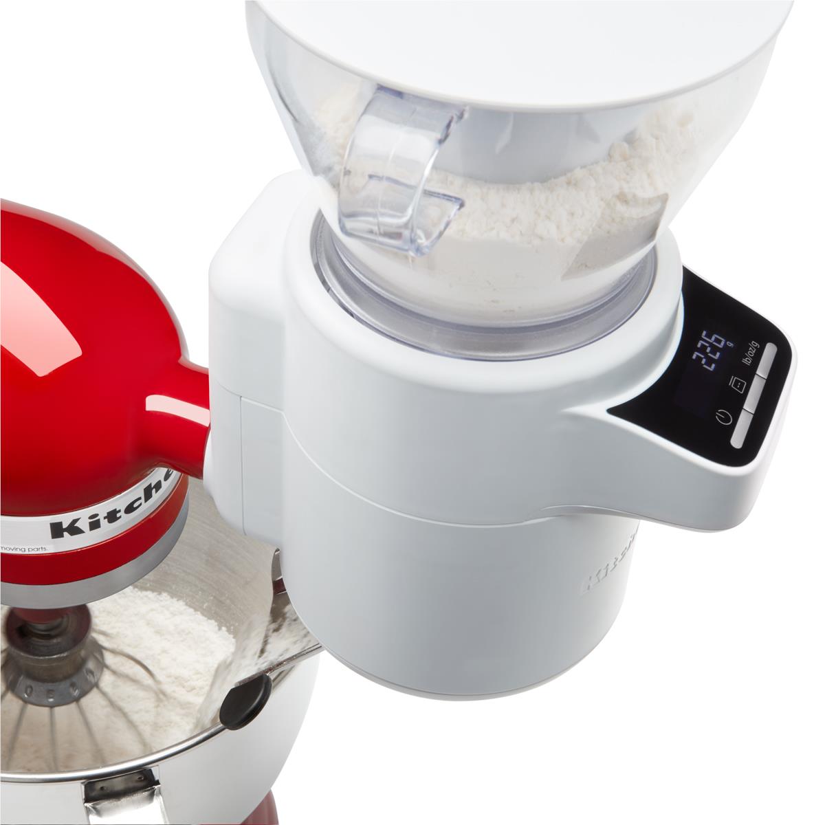 Close-up of KitchenAid sifter hopper with transparent chute and black control display