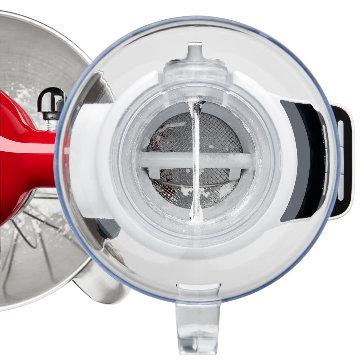 Top view of KitchenAid sifter drum inside clear funnel with mesh filter