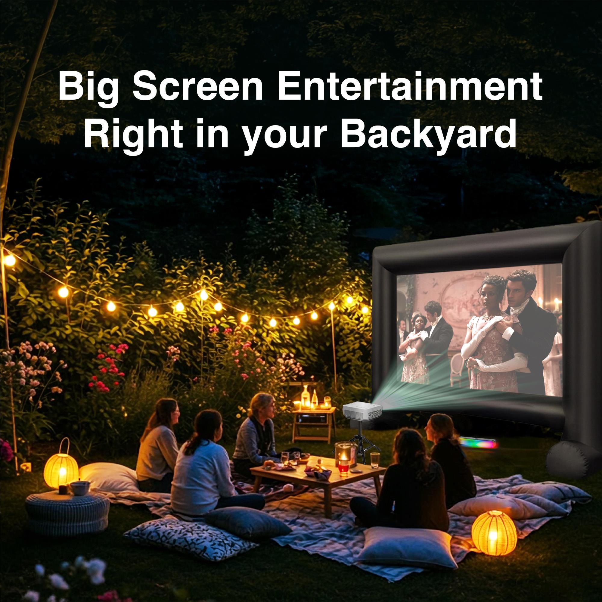 Outdoor cinema projector bundle with inflatable screen on a backyard lawn