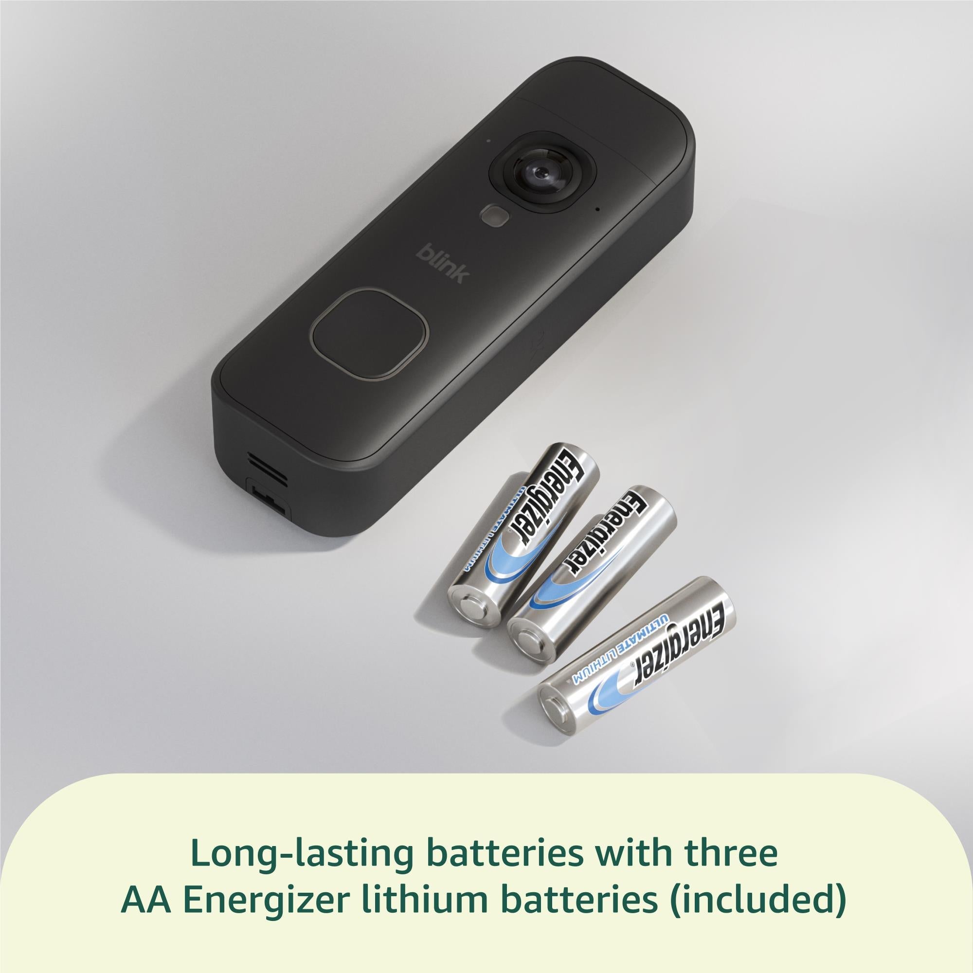 Black video doorbell with included AA batteries for power
