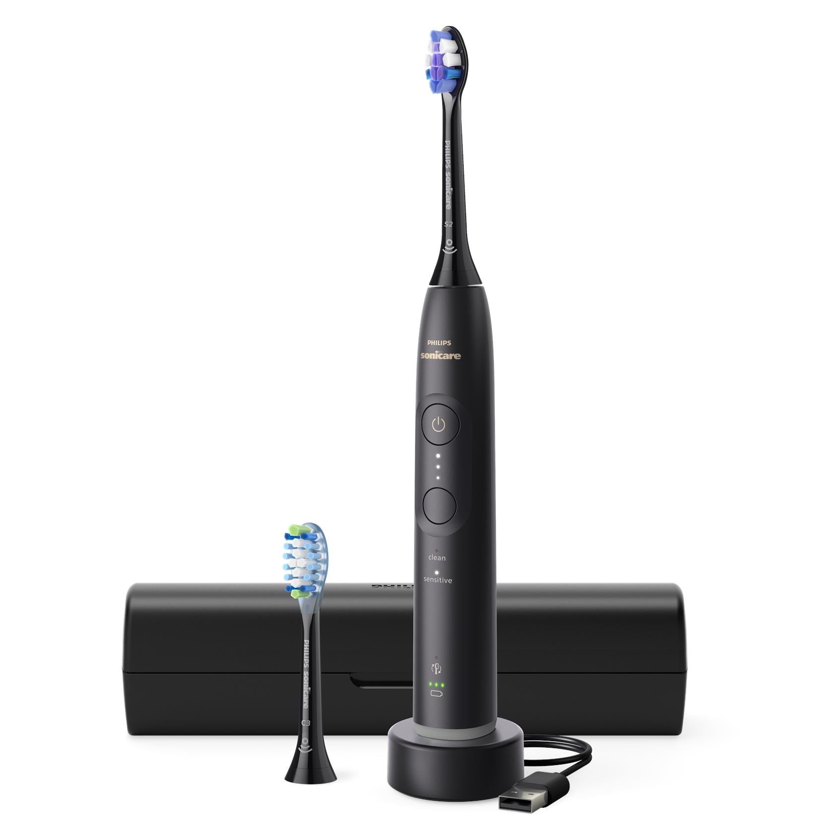 Black Philips Sonicare electric toothbrush with charging stand and blue brush head
