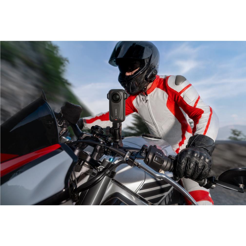 Insta360 X6 mounted on motorcycle for action recording, rider in red and white