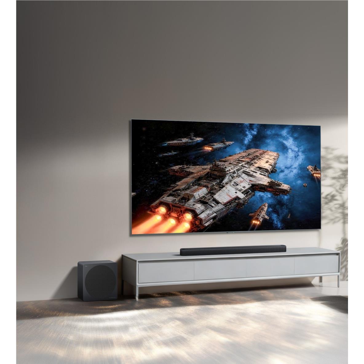 TCL soundbar and wireless subwoofer on media console