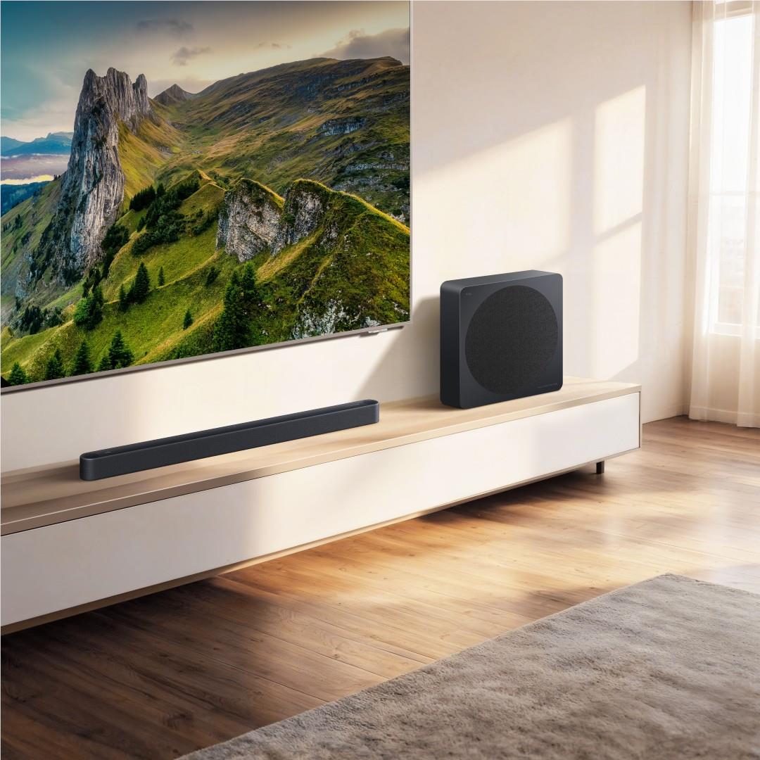 TCL soundbar with wireless subwoofer on console