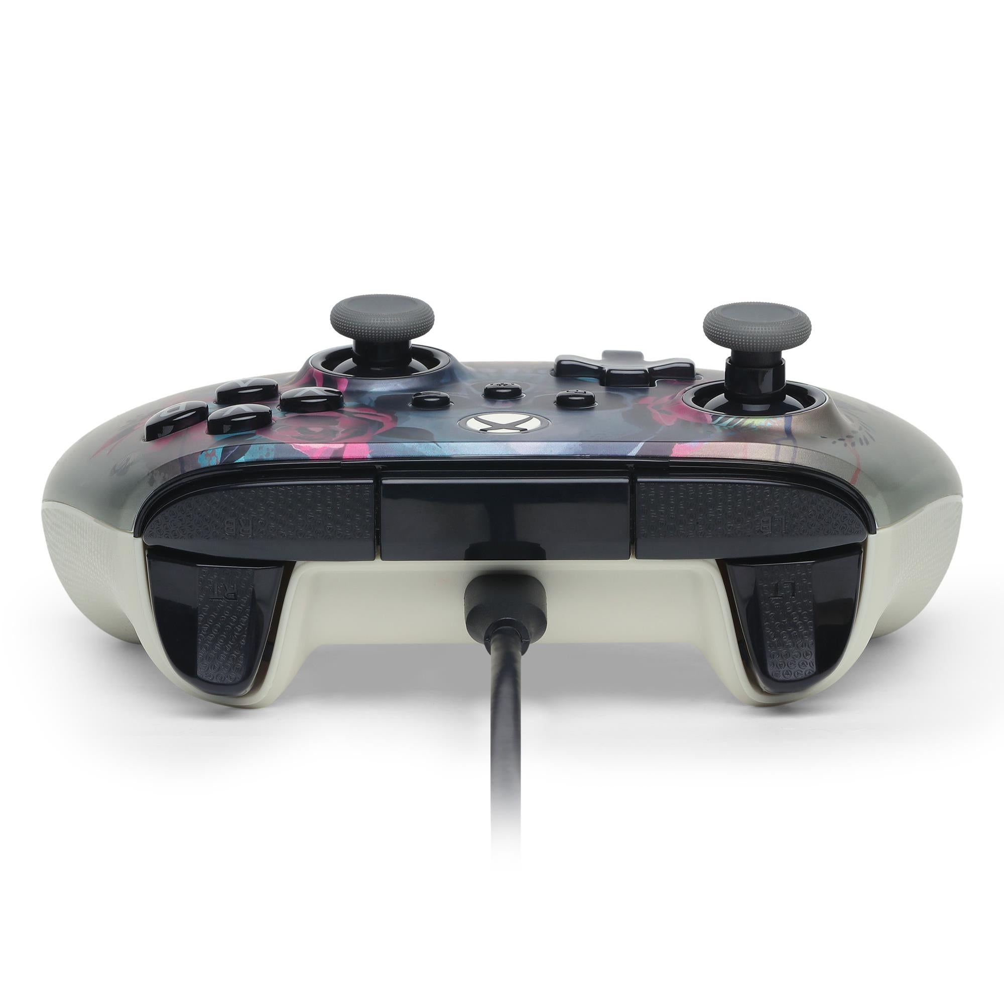 Wired Xbox controller underside with black grips and center wired connection plug