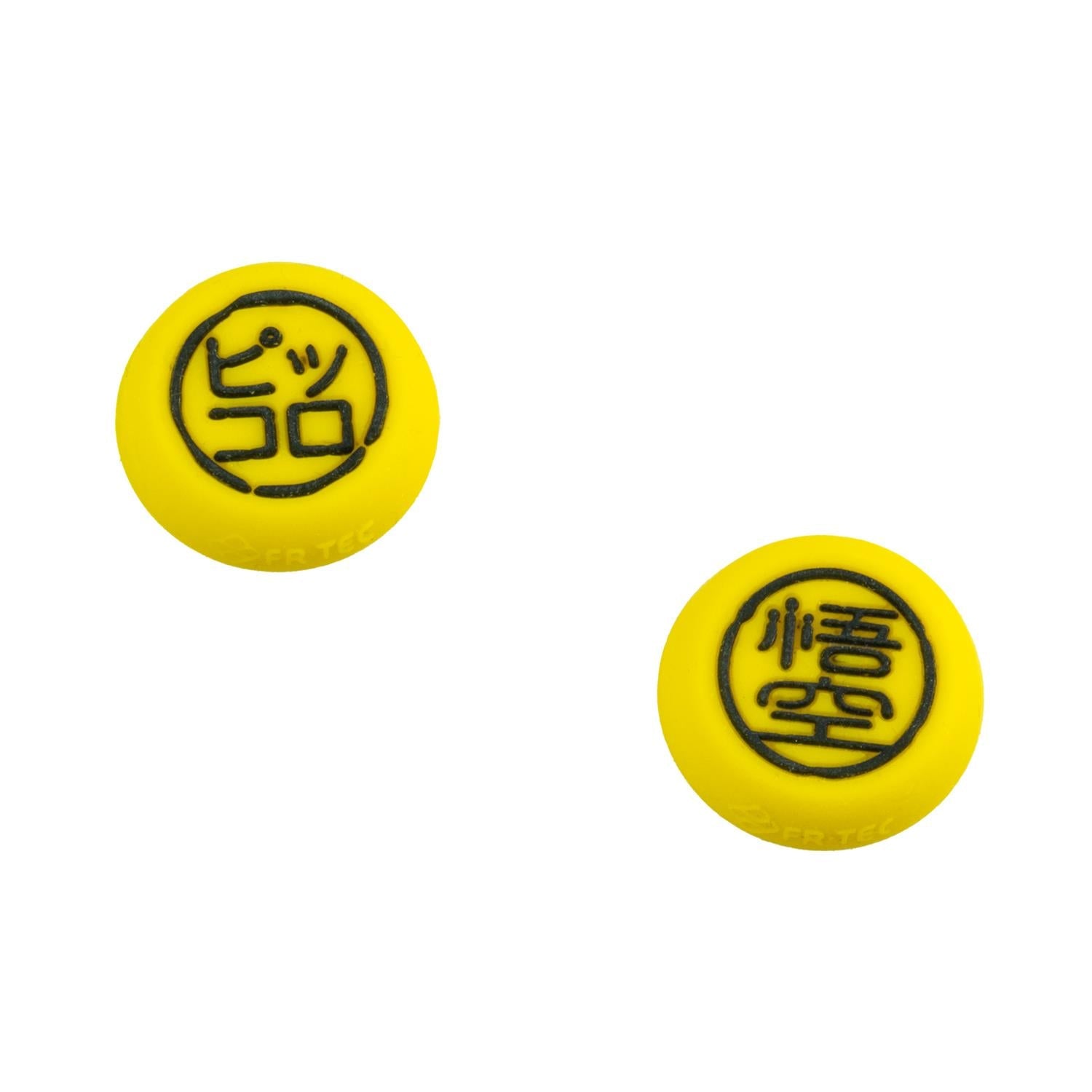Pair of yellow thumb grips with black circular icon for Xbox controller