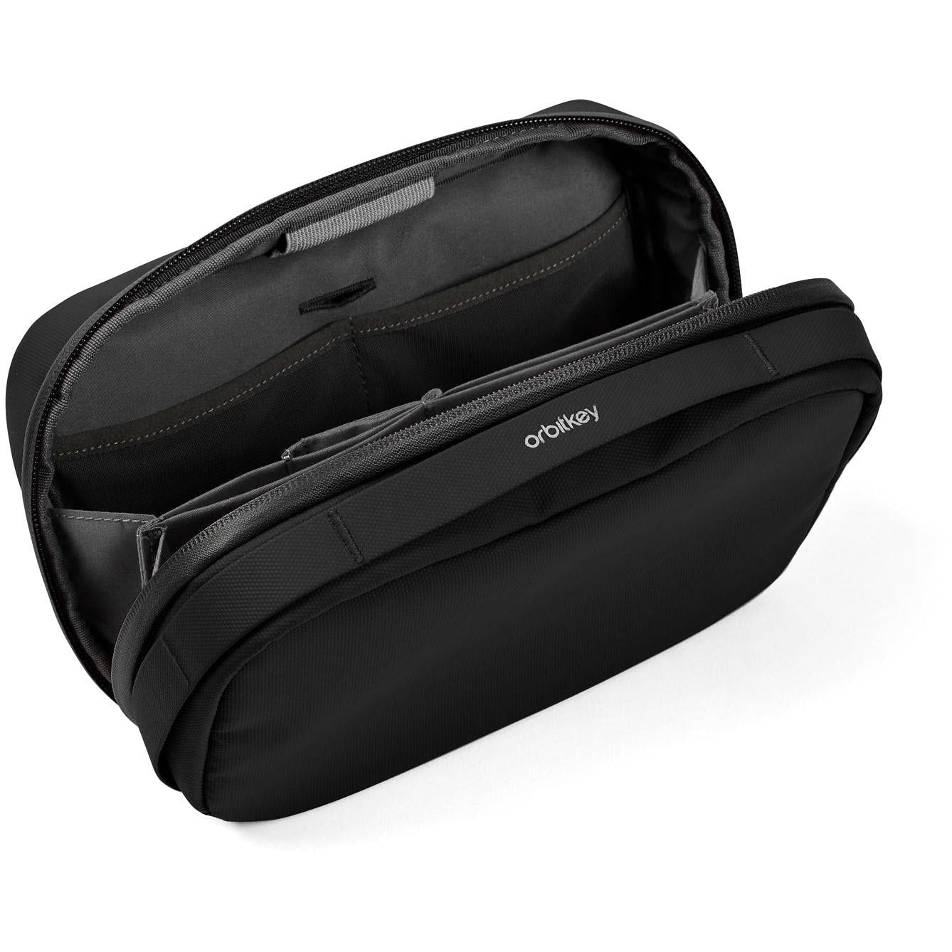 Black tech pouch organiser with padded organizer panel and front zip pocket
