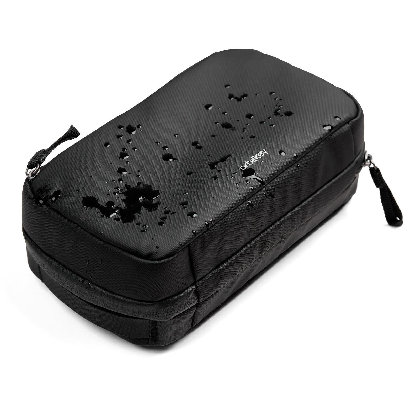 Black tech pouch organiser with dotted speckle finish and zippered top