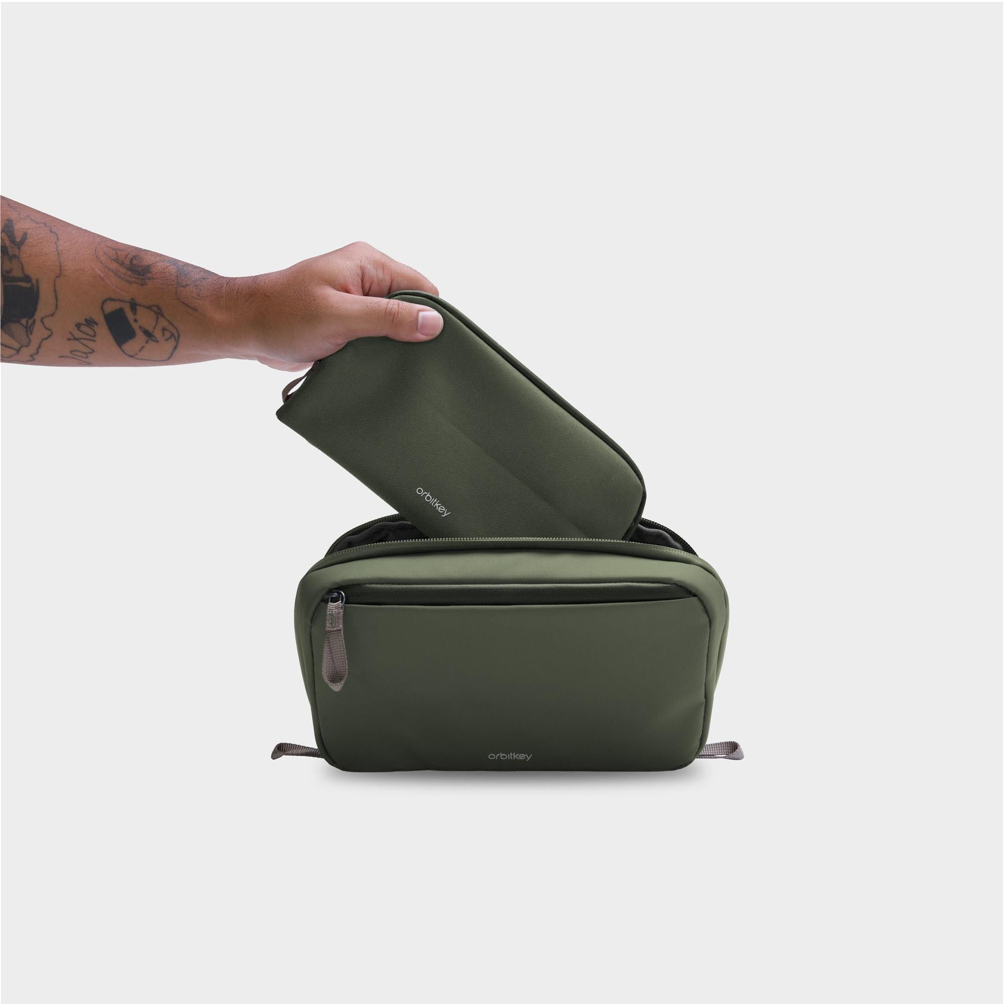 Olive green 2-in-1 tech pouch with handle on top and front zipper closure