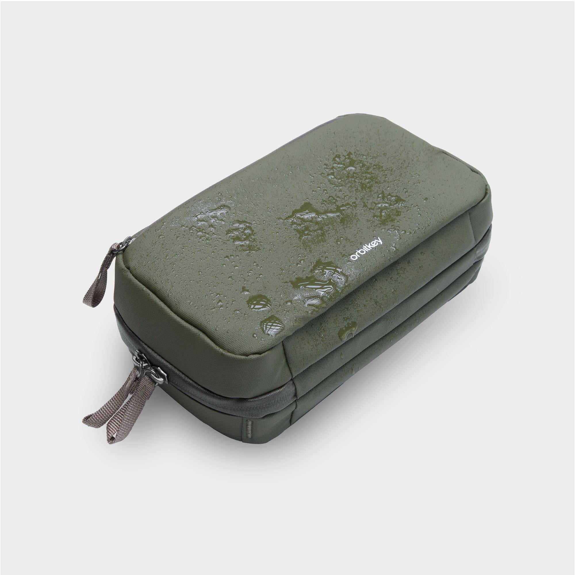 Olive green slim tech pouch with zipper, corner straps, and embossed branding