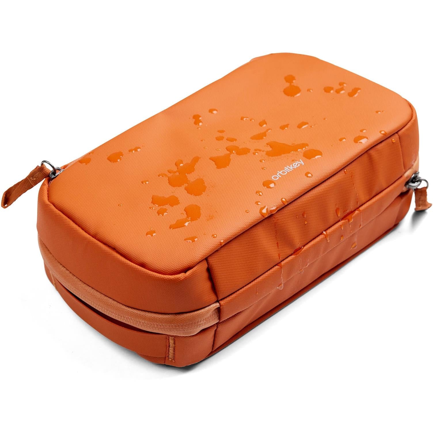 Terracotta Orbitkey pouch with textured finish and top zipper