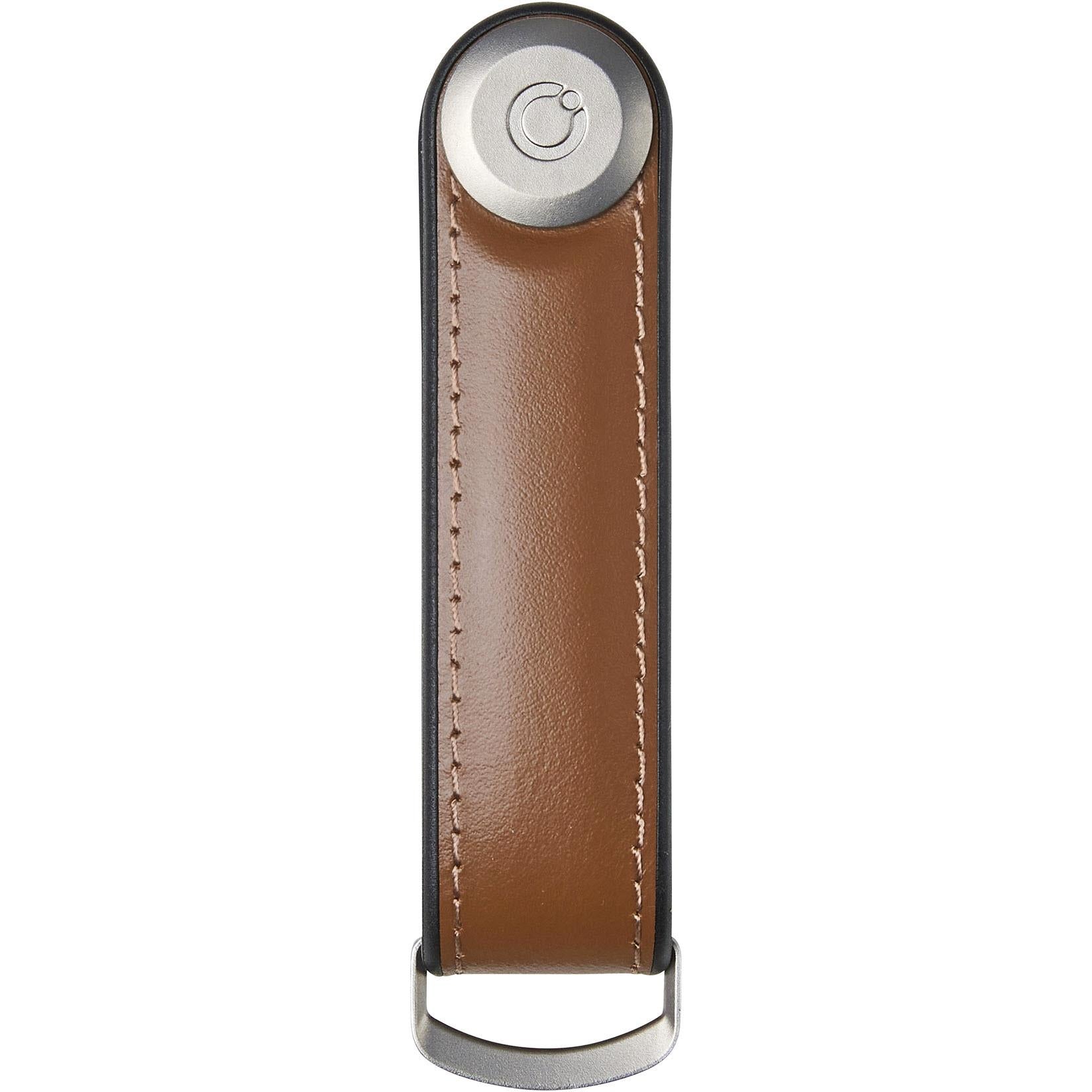 Brown leather key holder with D-ring and round metal locking cap.