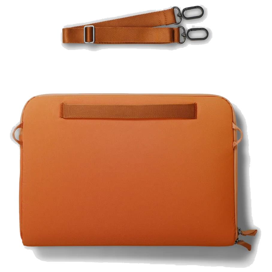 Terracotta laptop sleeve with front webbing handle and zip end tabs