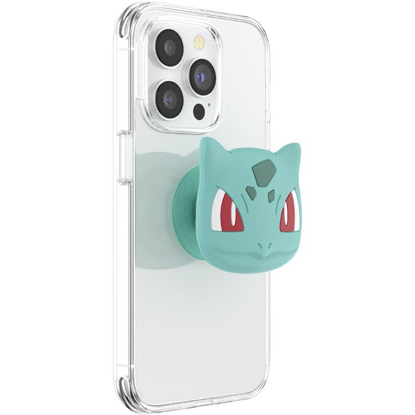 Teal Bulbasaur face PopGrip on clear phone case, side view showing grip thickness.