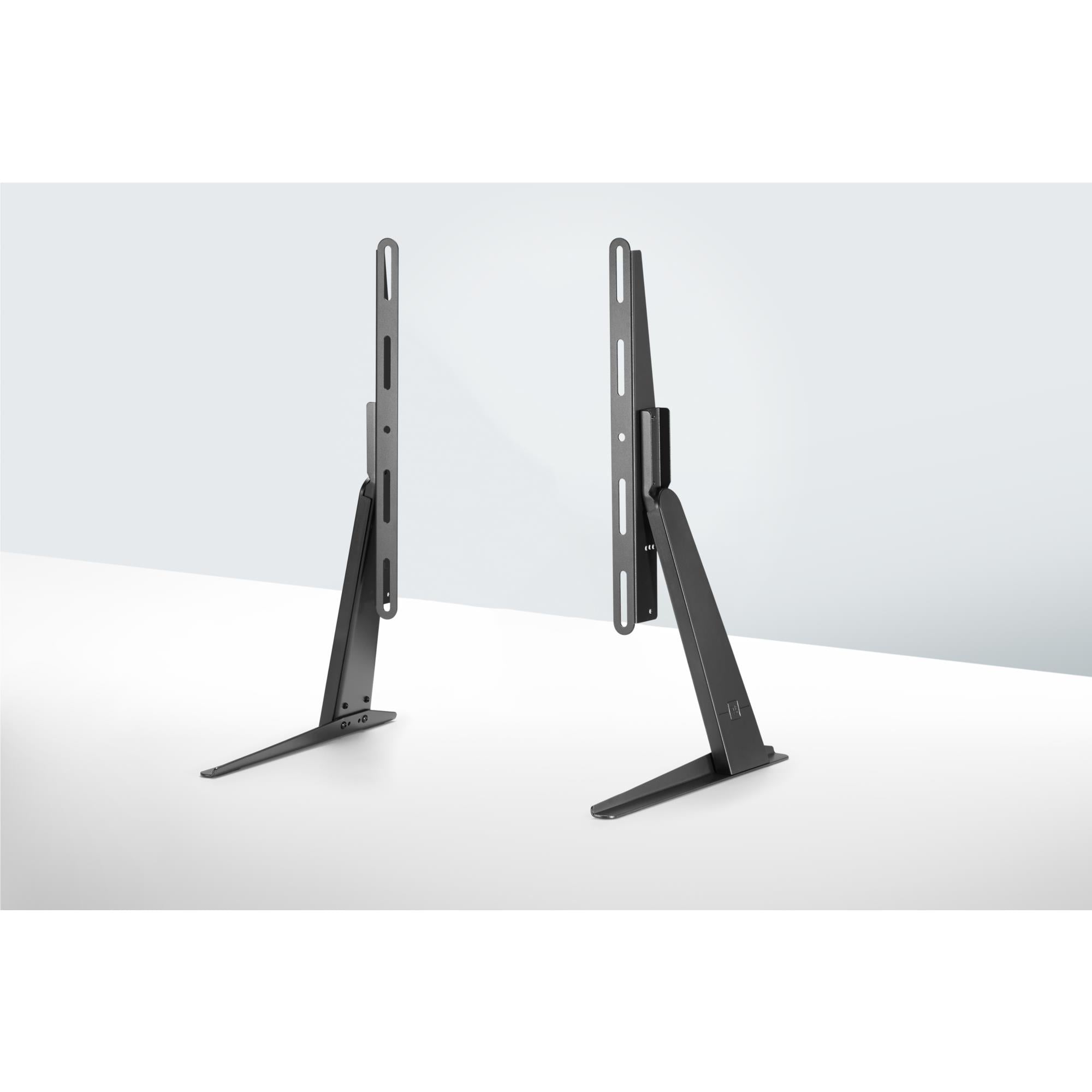 Black TV tilt stand with two slim support arms and wide base feet
