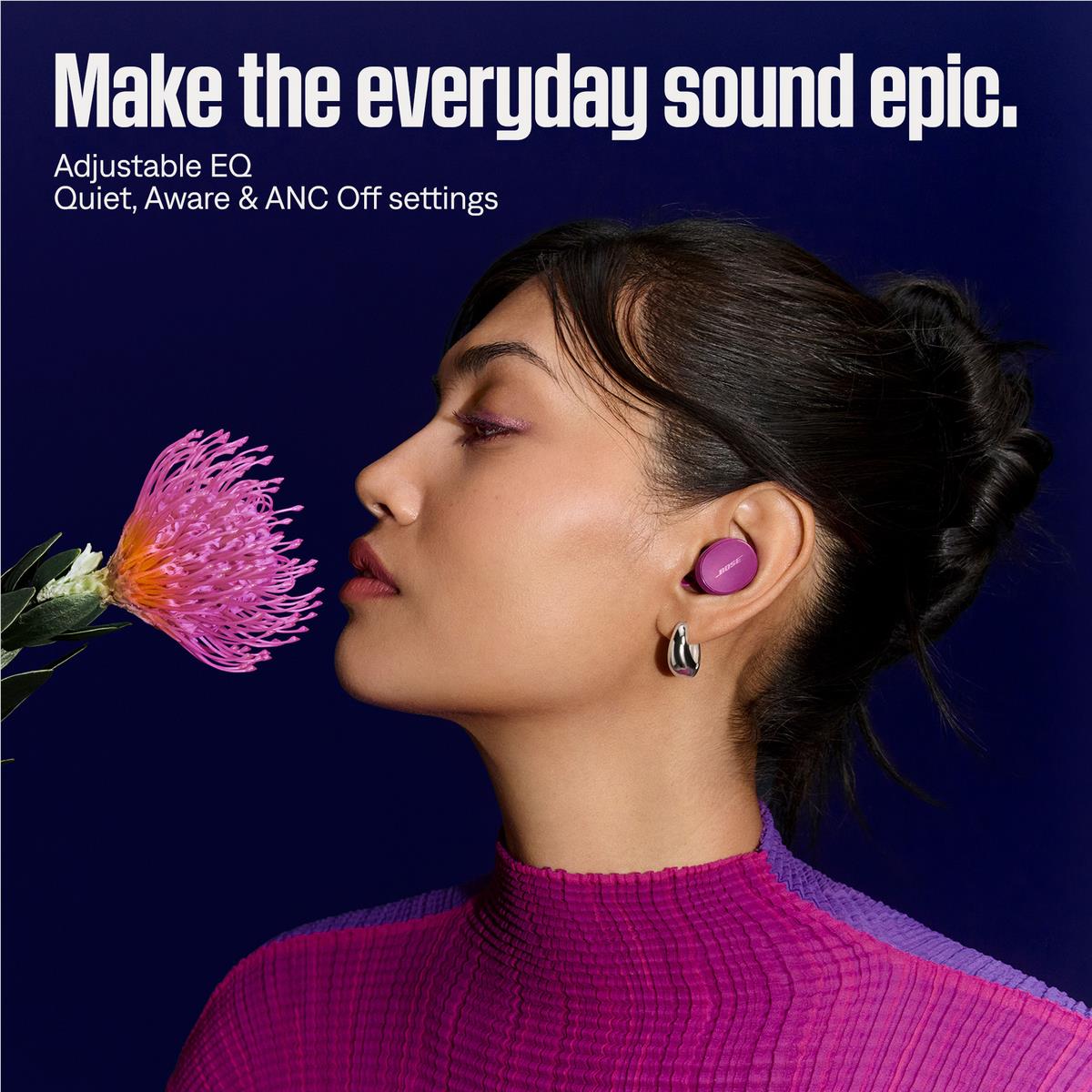 Rosewood mauve in-ear earbuds on model ear, Bose wireless earbuds