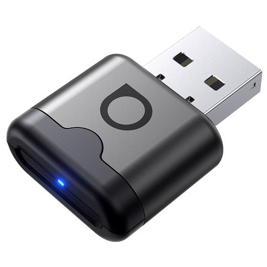 Ottocast Mini Aura wireless CarPlay adapter with black casing and USB-A connector